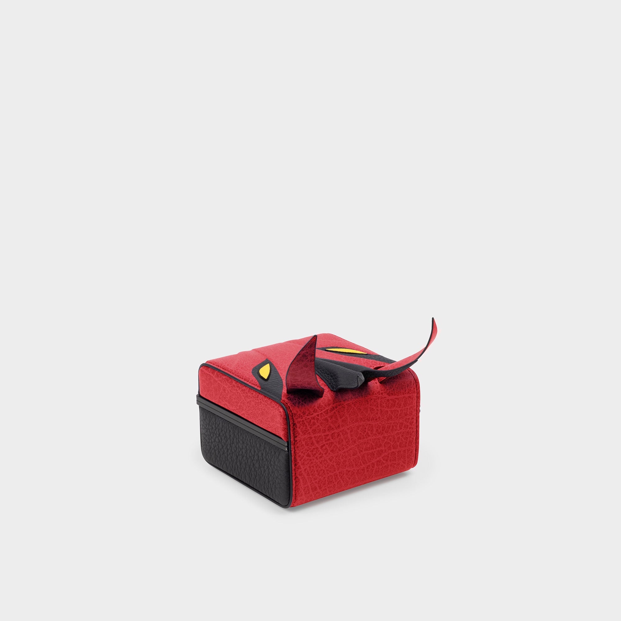 Product photo of the lunar new year dragon watch case showcasing the red leather and dragon scale texture of the material.