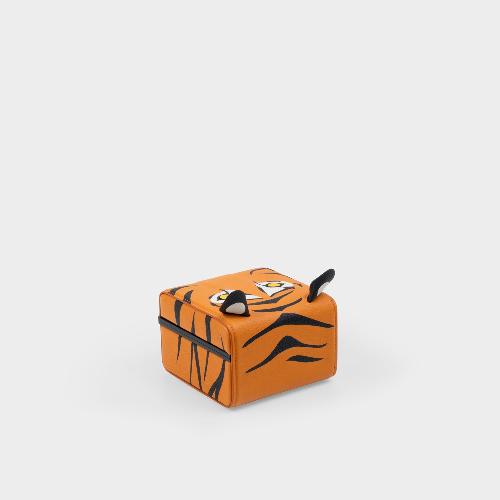 Product photo of back of the handmade Eaton 1 Special edition watch case showing the bold tiger design featuring intricate leather inlays and animal ears.