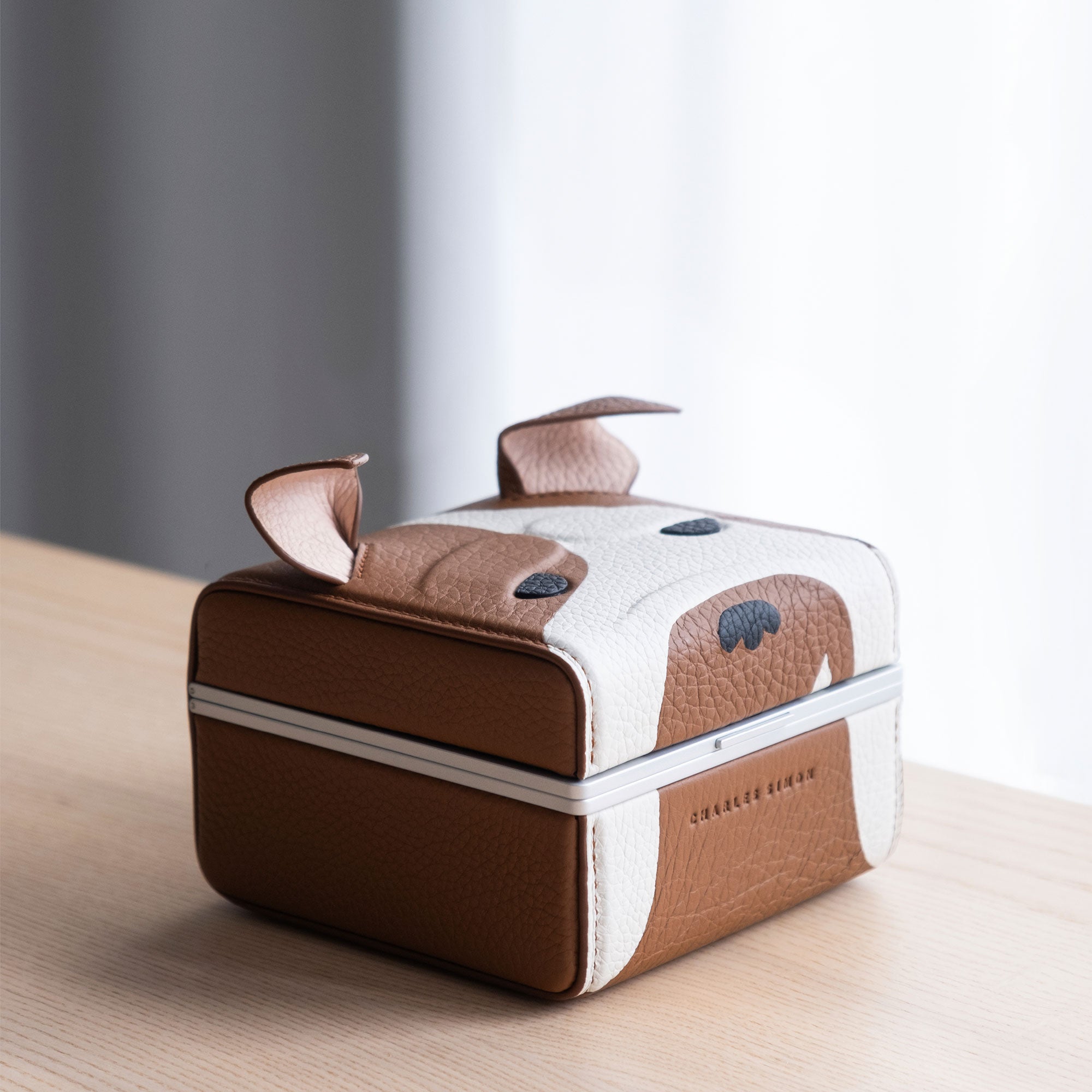 Lifestyle photo of the Bulldog Eaton 1 special edition watch case showing the case's lovable dog design