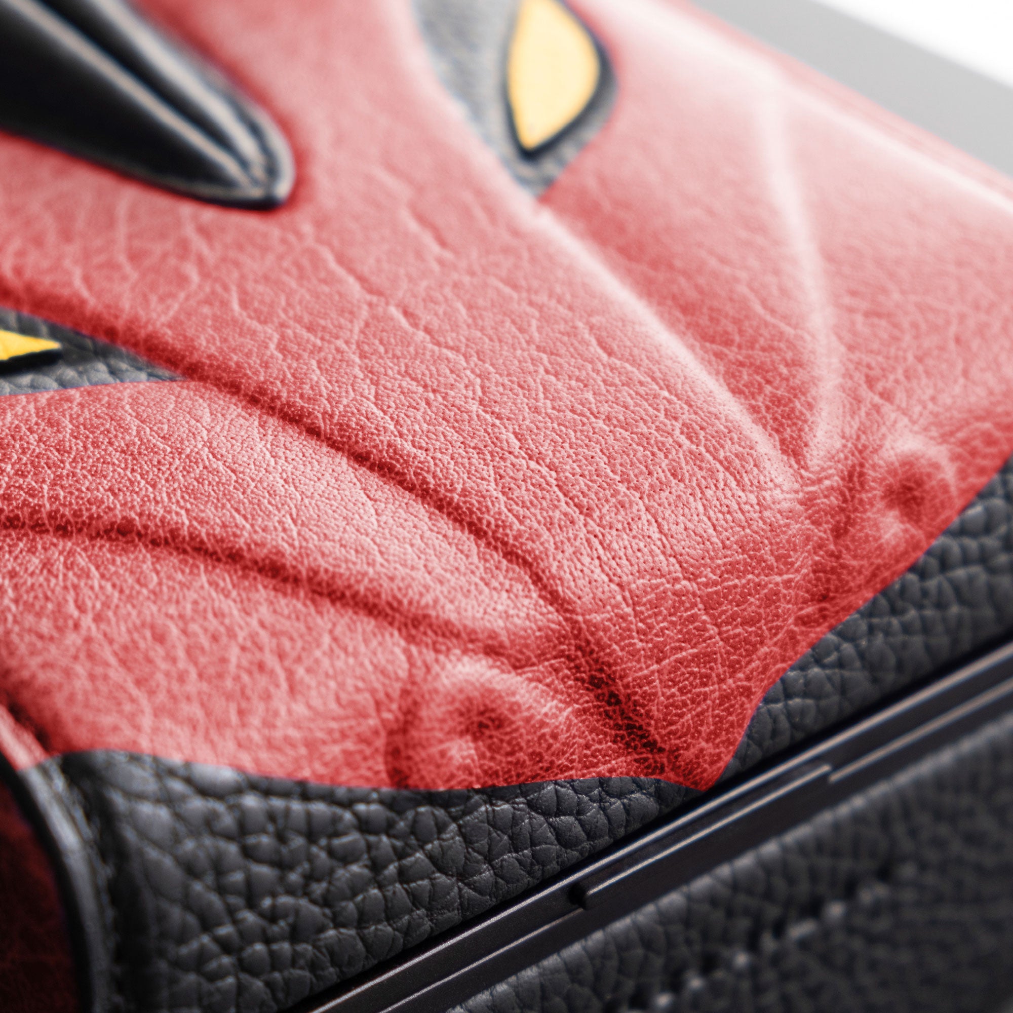 Lifestyle photo of leather work details on the red dragon Eaton 1 special edition watch case for 1 watch. 