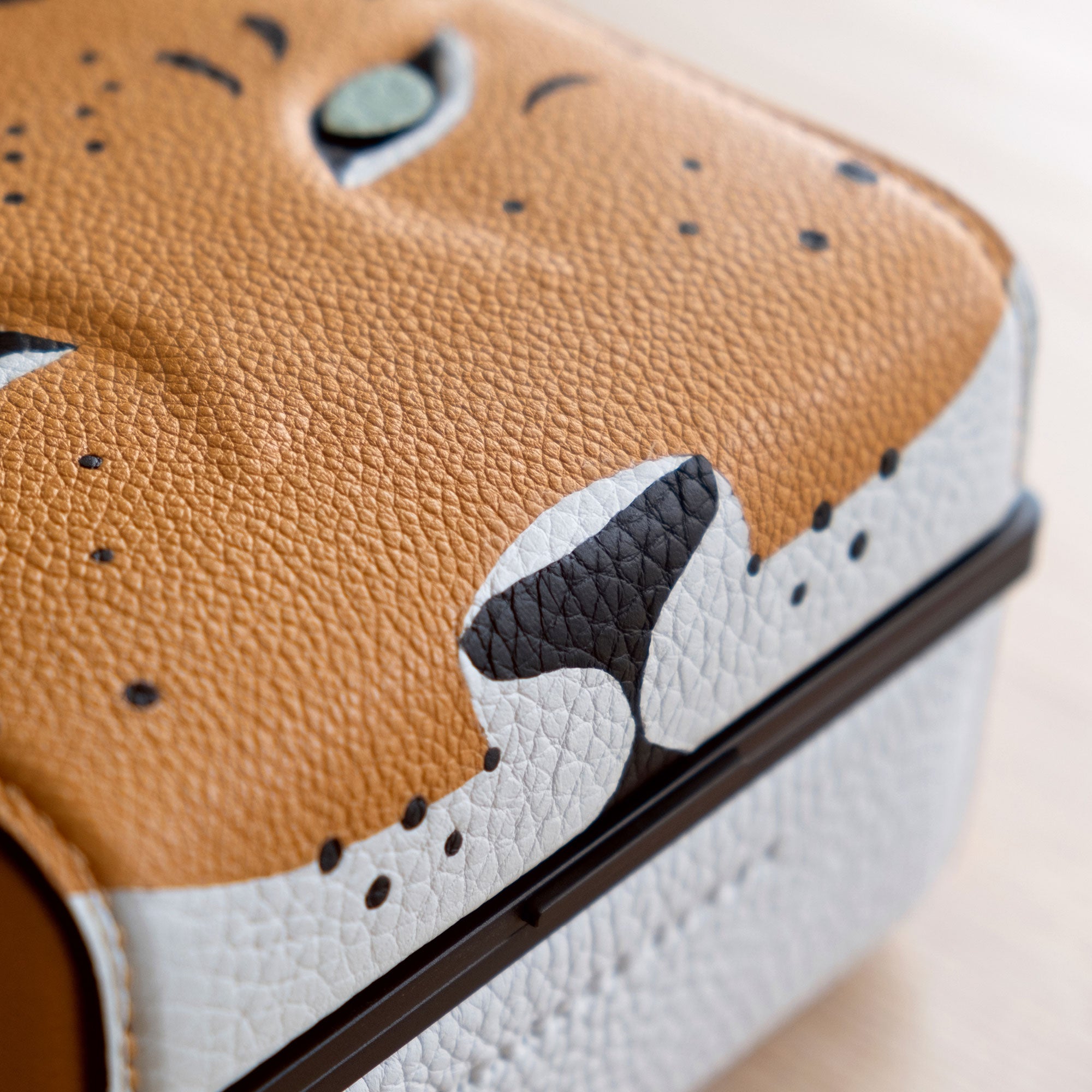 Detail photo of leopard snout and face of the handmade Special Edition Eaton 1 Leopard Watch case