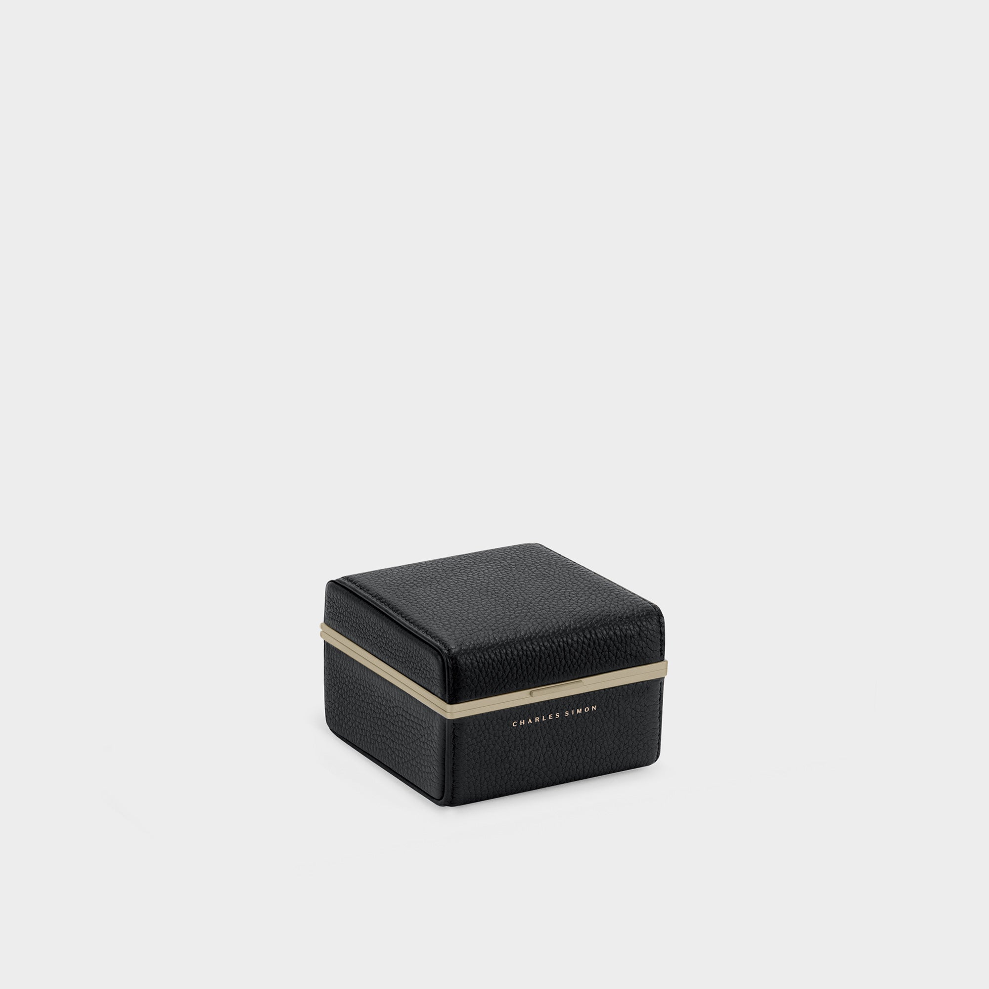 Product photo of closed Eaton 1 Watch case for 1 watch in gold aluminum and black leather. Made in Canada.