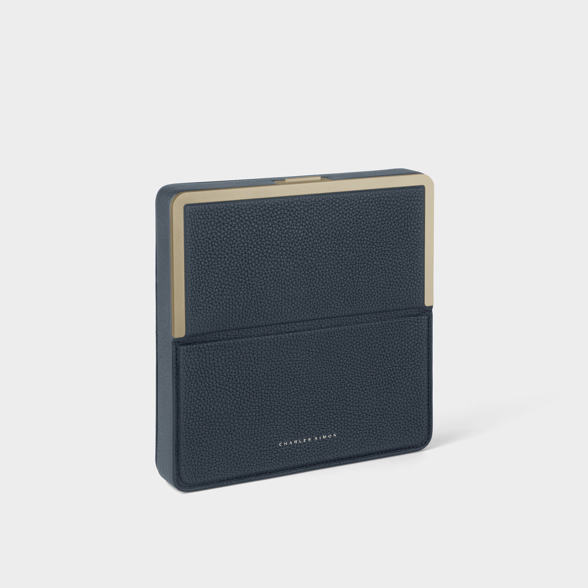 Product photo of gold travel wallet in marine leather. Handmade in Canada to carry all essential travel goods