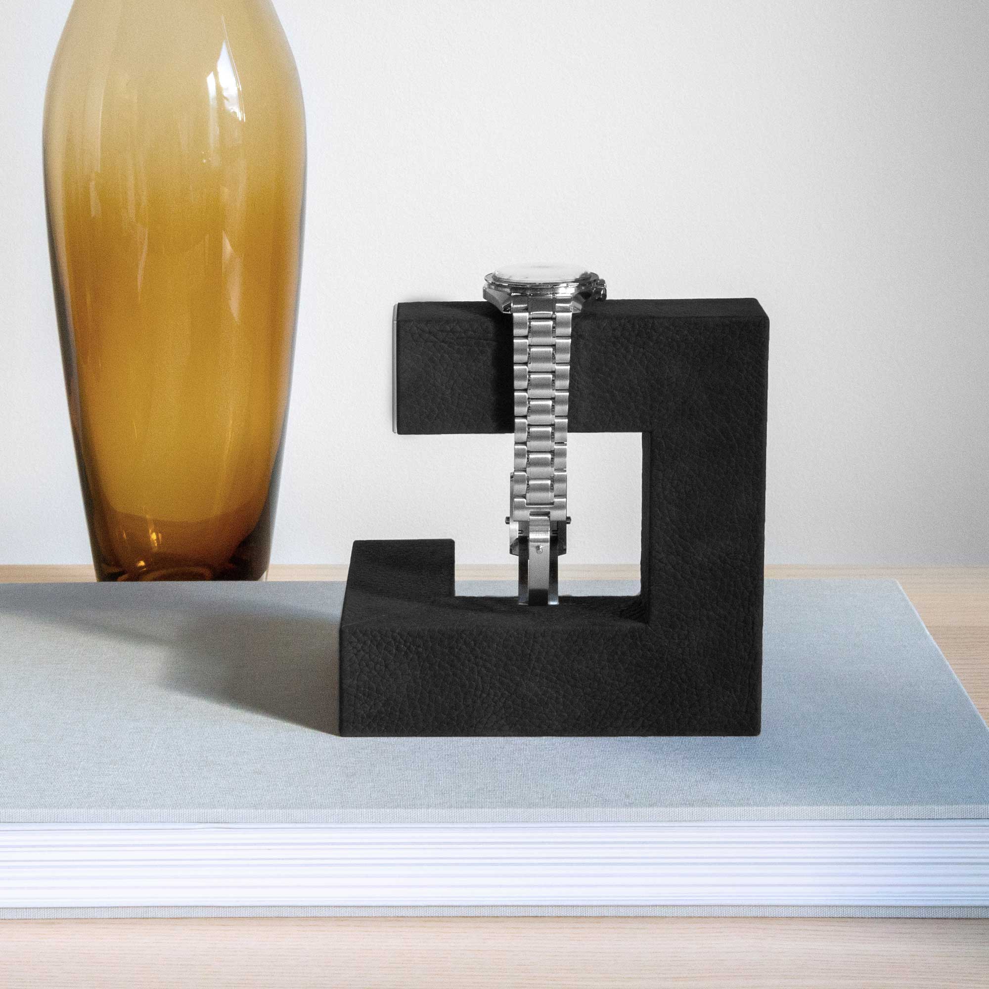 Luxury watch displayed on Hudson 1 Watch stand in black nubuck leather