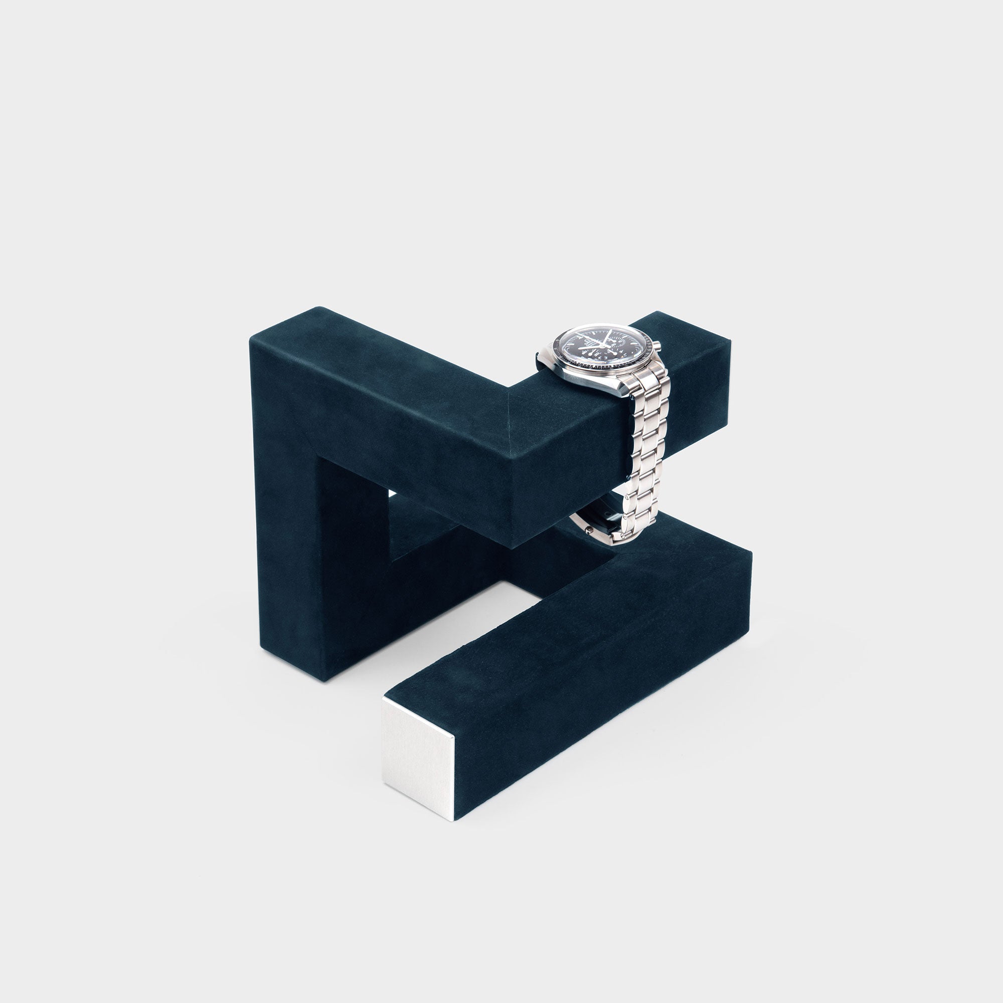 Handmade watch stand in navy-teal nubuck leather holding 1 men's watch