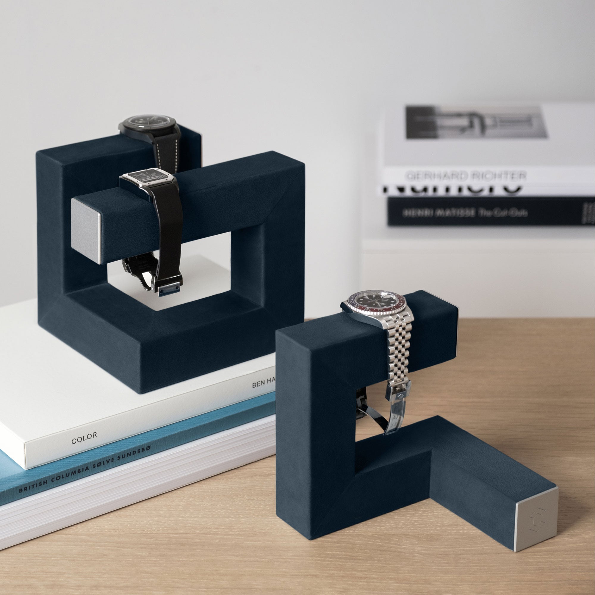 Lifestyle shot of Hudson Duo in navy-teal nubuck showcasing 3 luxury watches in modern, minimalist home interior