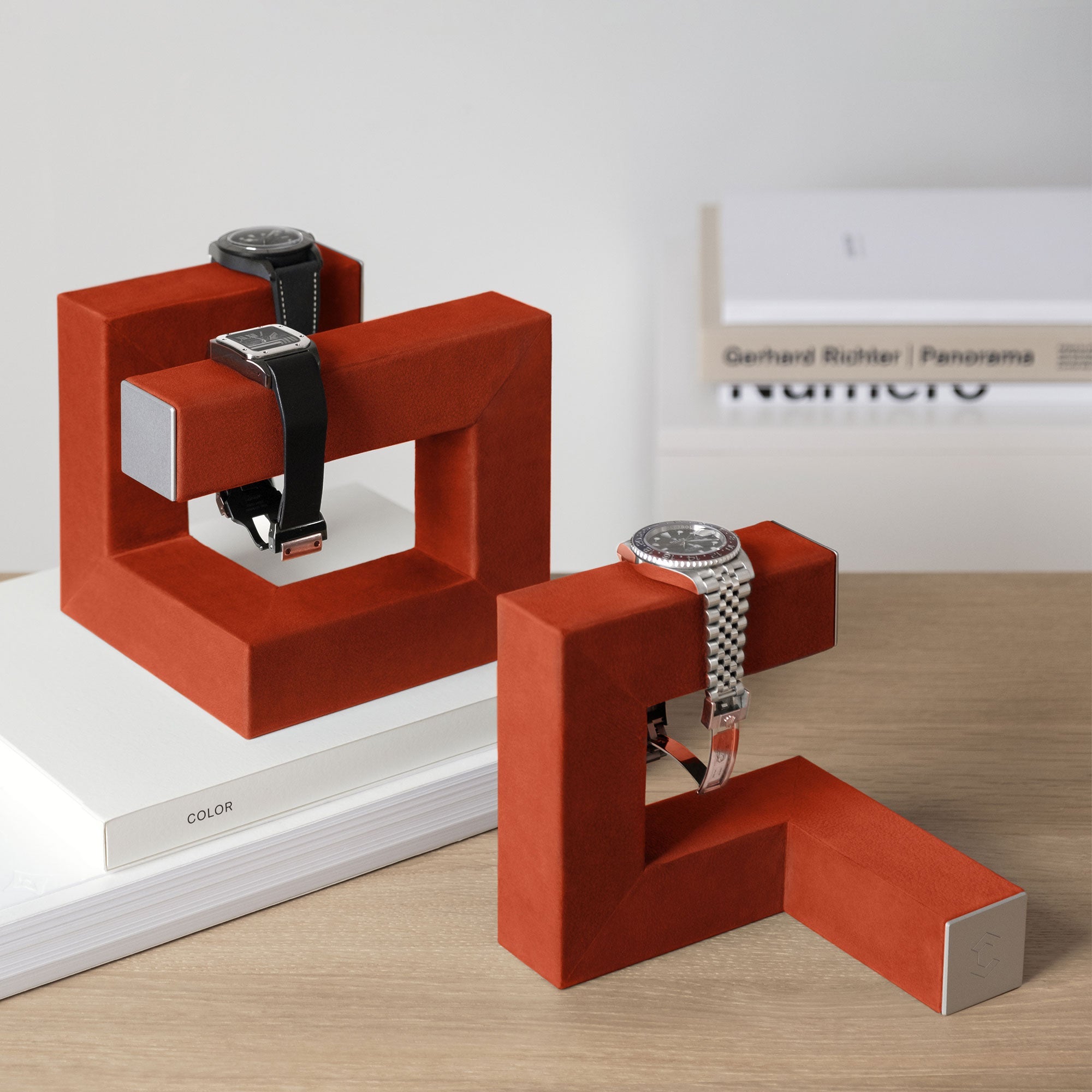 Hudson Duo watch stand in colorful pimento nubuck leather showcasing 3 luxury watches in modern home