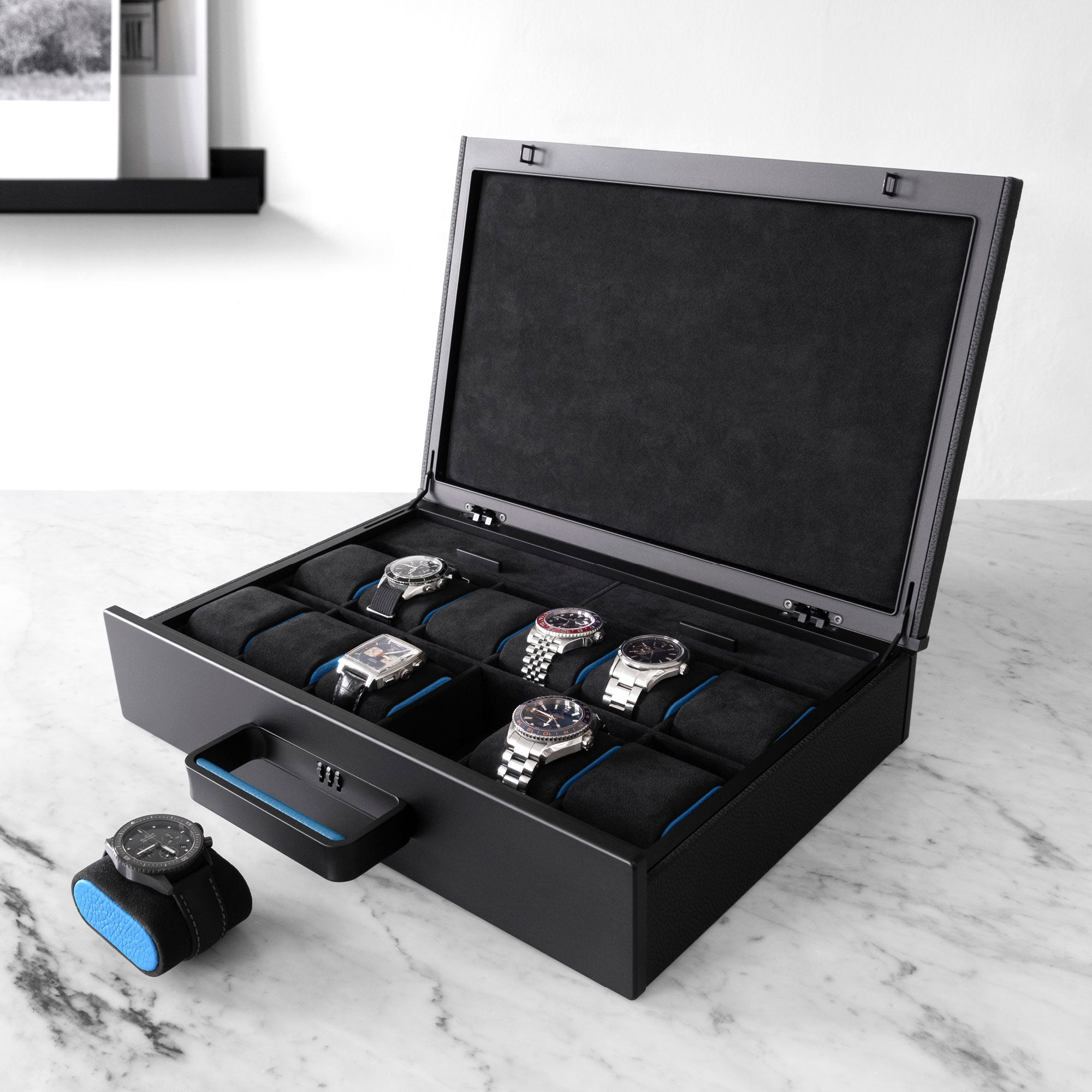 Designer Watch briefcase for 12 watches in black leather, carbon fiber, black anodized aluminum and black Alcantara interior with luxury watches including Tag Heuer, Rolex, Blancpain and Omega