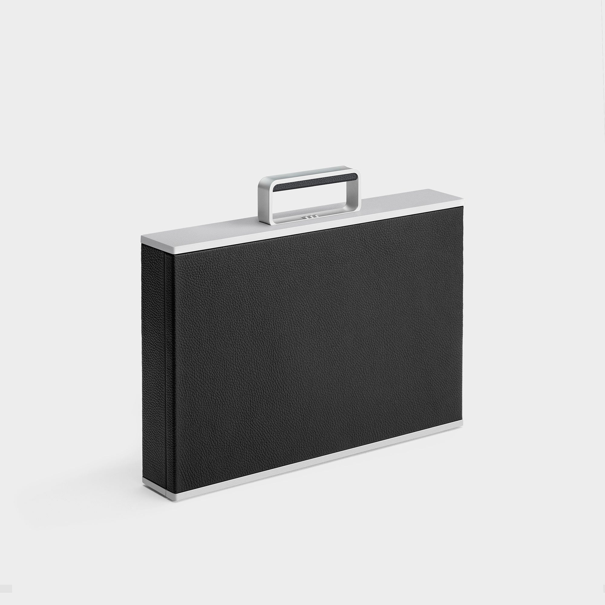 Designer watch briefcase for up to 12 watches made by hand in Canada from carbon fiber and anodized aluminum, French leather and Alcantara.
