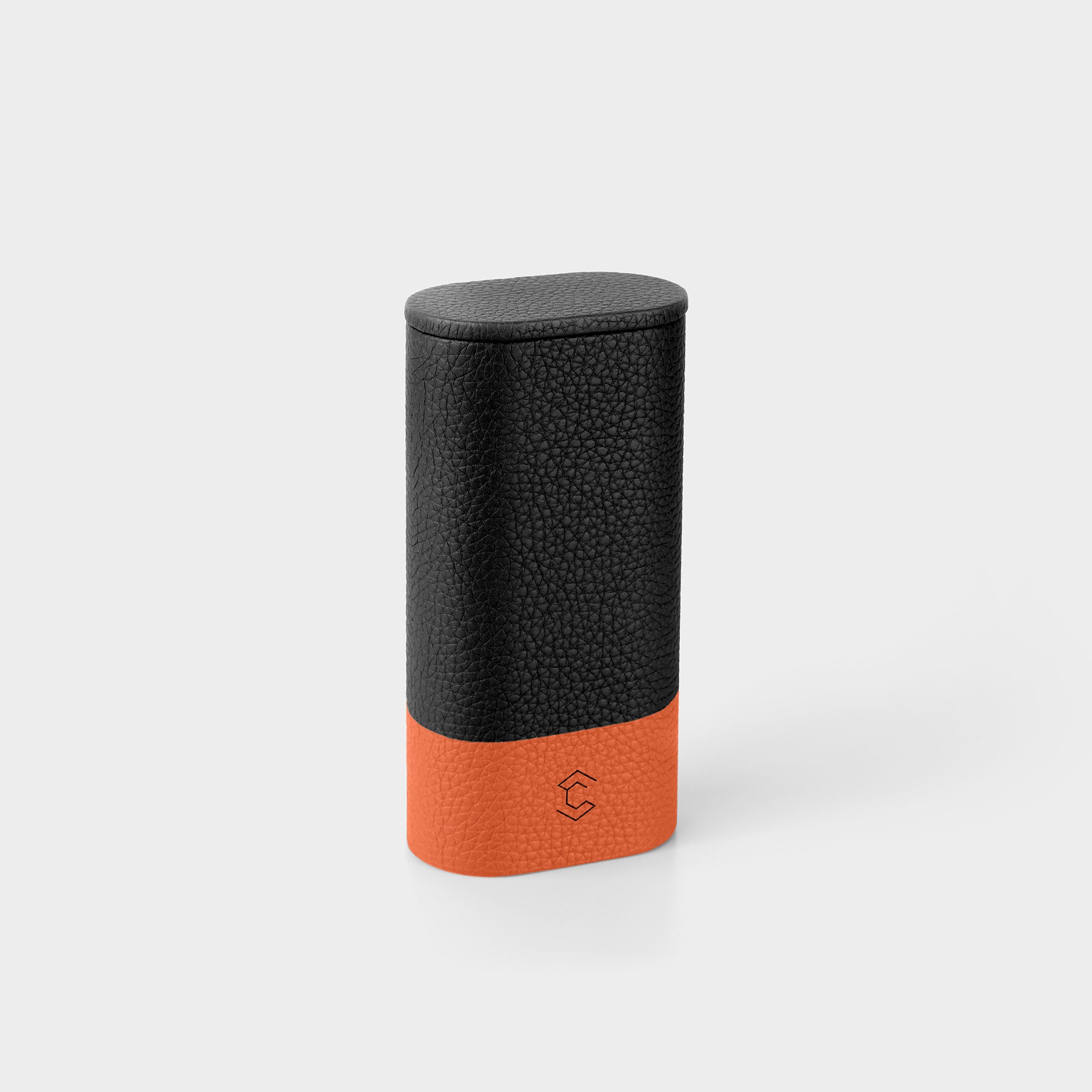 Leather watch roll single watch travel case, sleek compact format offering secure watch protection. Black and orange durable leather.