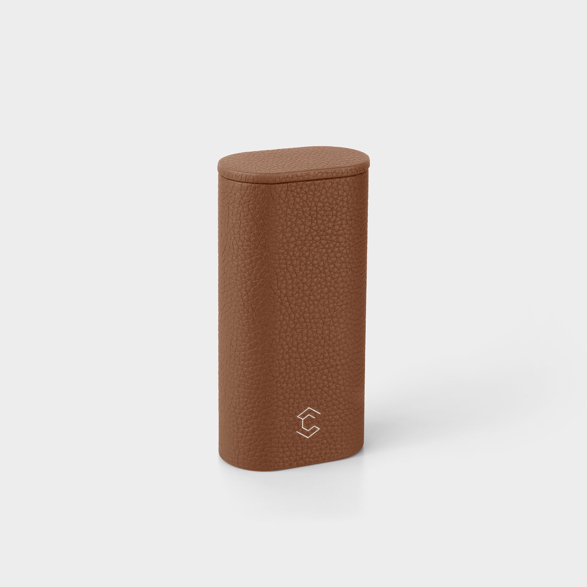 Product photo of closed standing Oscar 1 Tall Travel Watch roll made from tan leather.