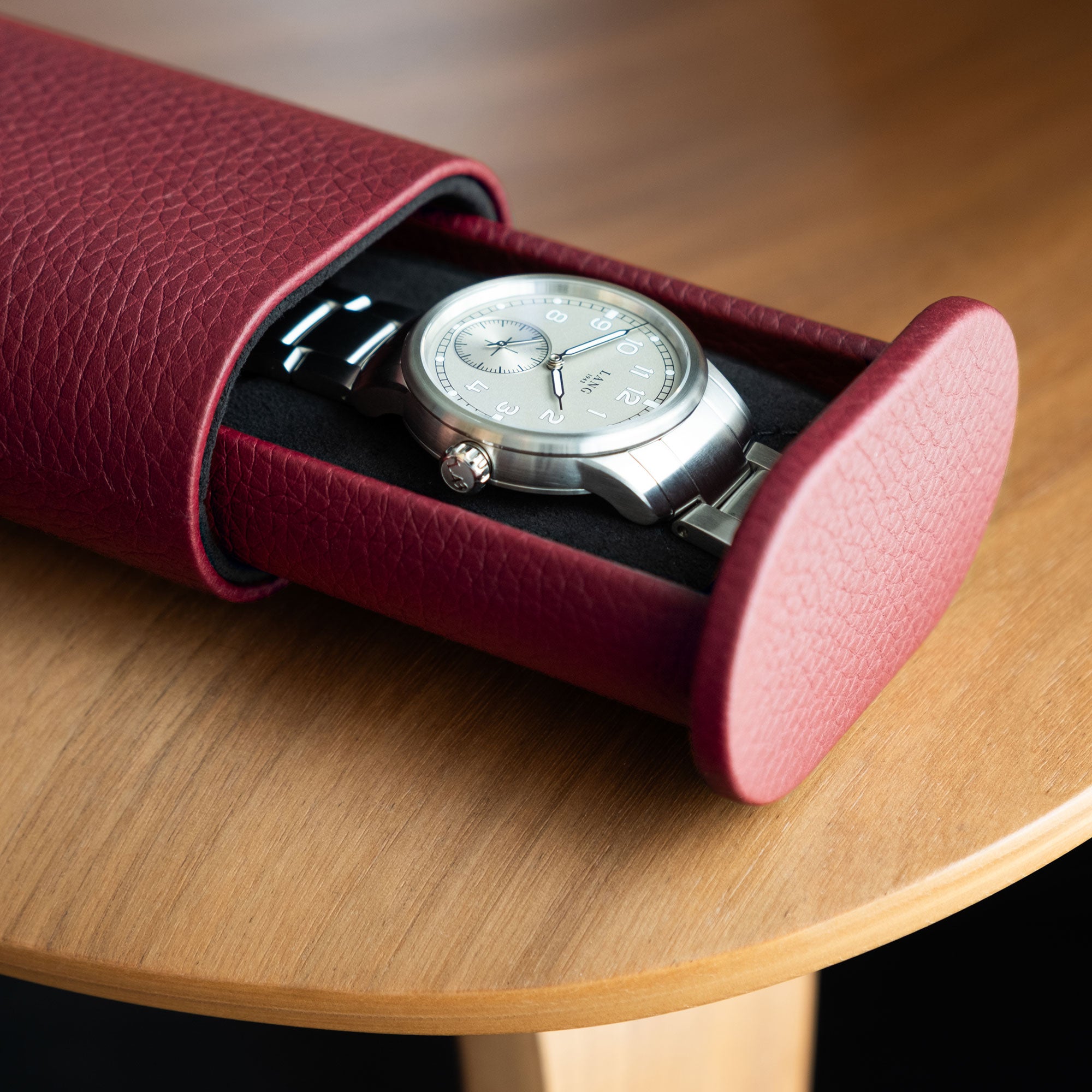 Travel leather watch roll for a single watch in burgundy