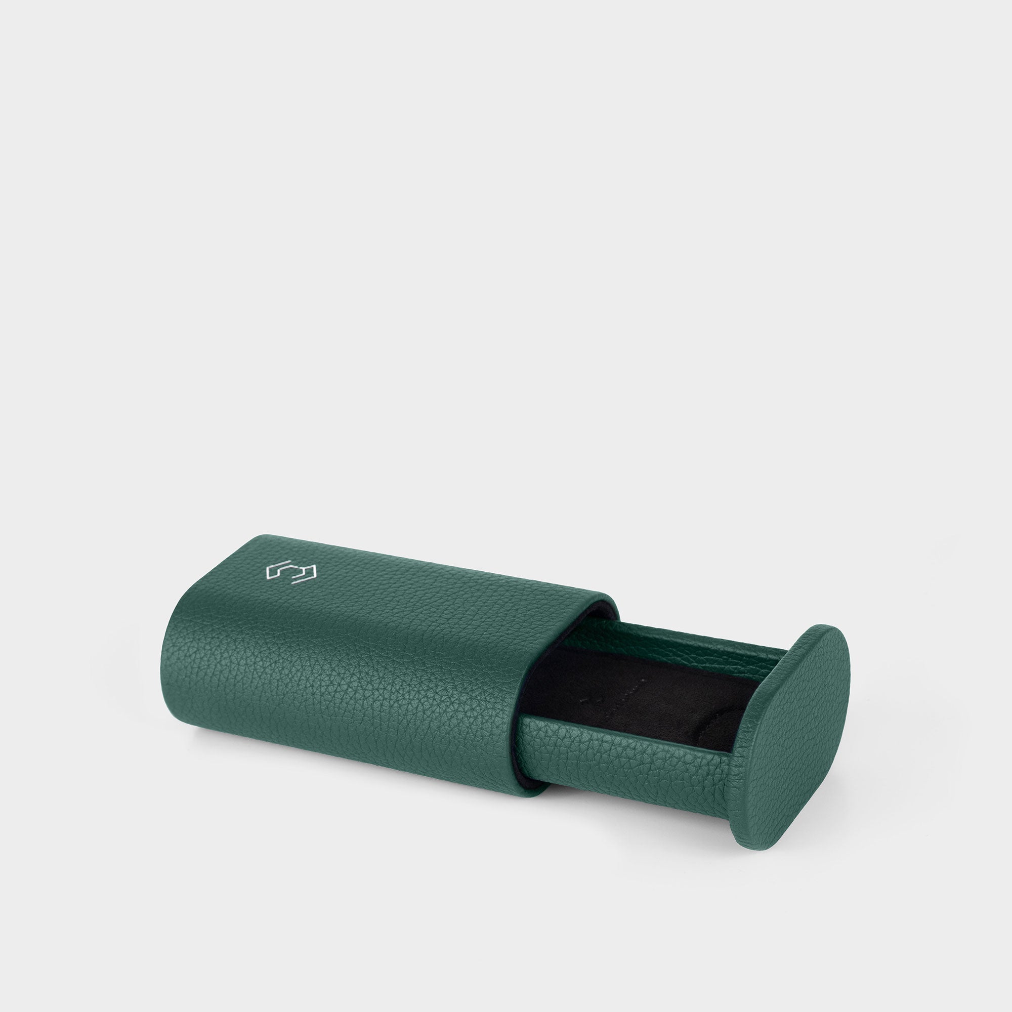 Product photo of open Oscar 1 Watch roll by Charles Simon. Handmade in Canada from emerald leather.