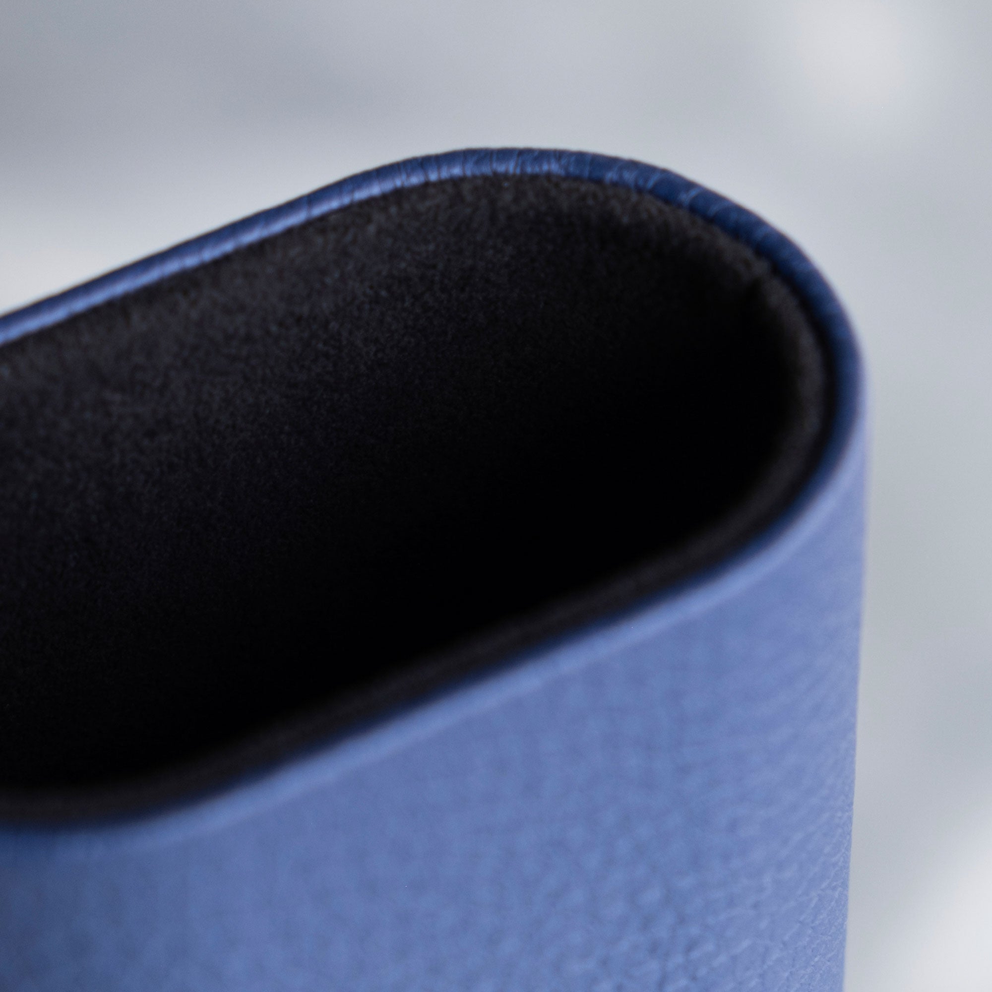 Closeup photo of sapphire french leather exterior and black interior lining of the Charles Simon Oscar Travel Watch roll.