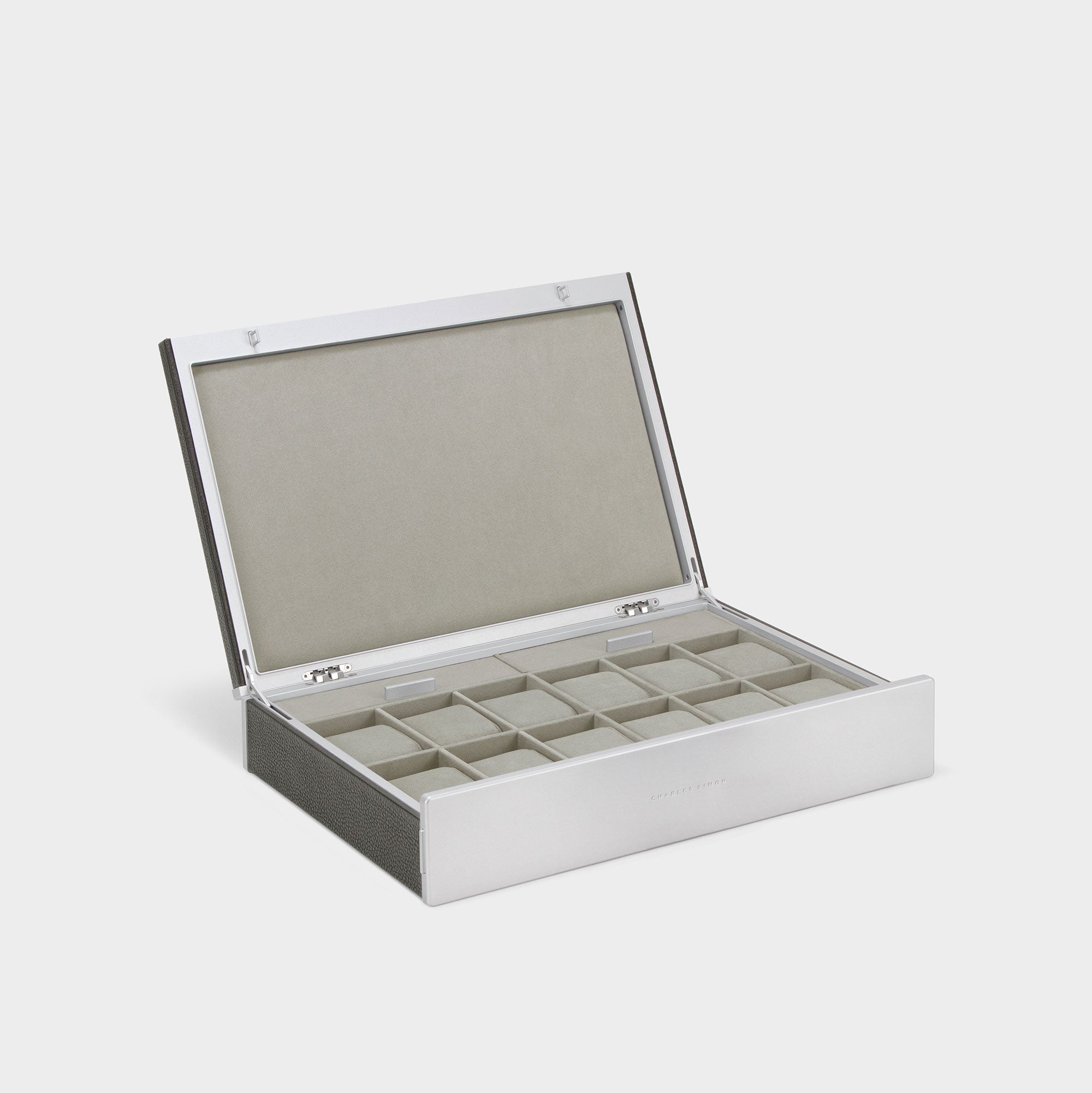 Product photo of open handmade watch box for 12 watches in graphite leather, carbon fiber and anodized aluminum casing and sea sand Alcantara interior