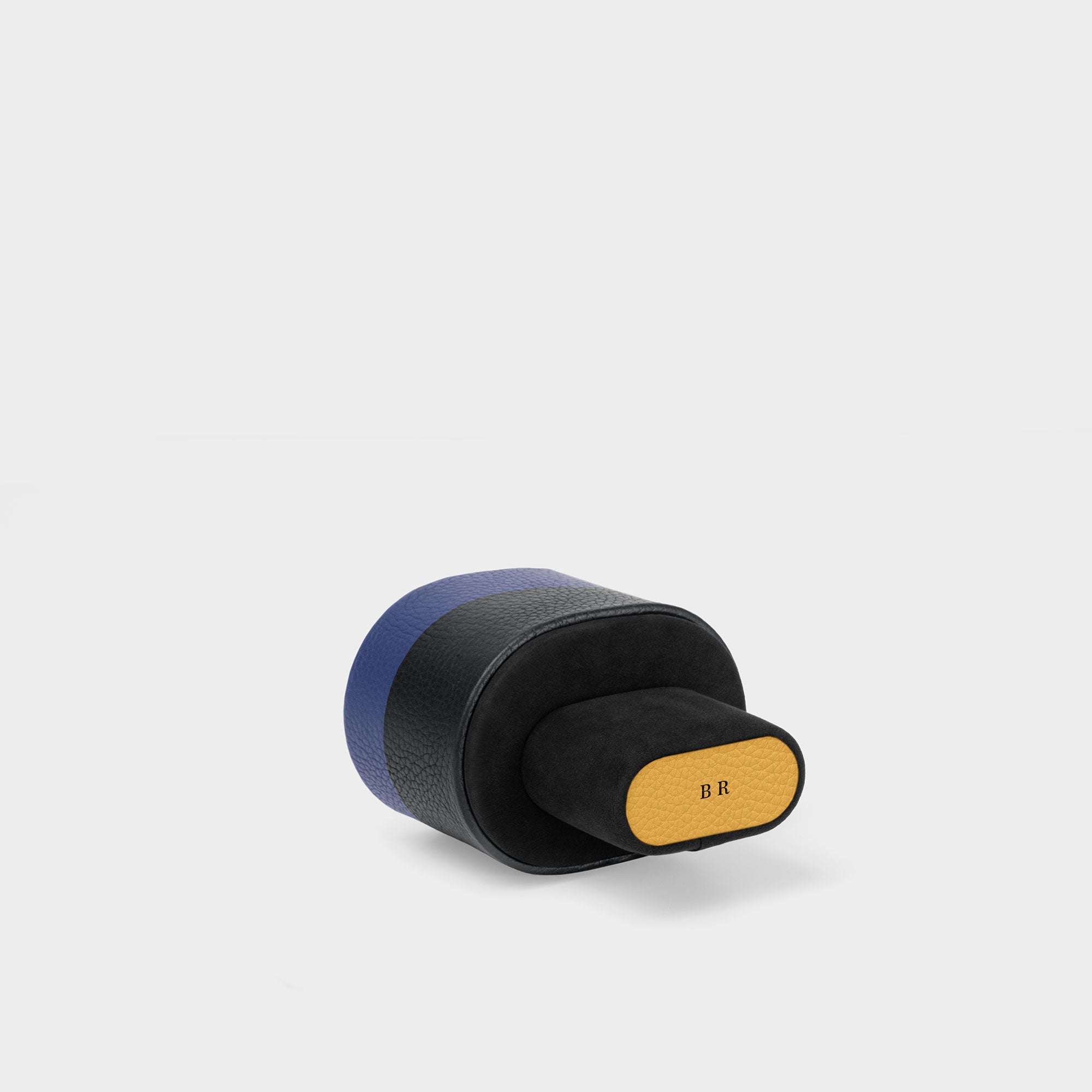 Product photo showing sleek initials hot stamping on the cushion available through the Charles Simon Personalization Service.