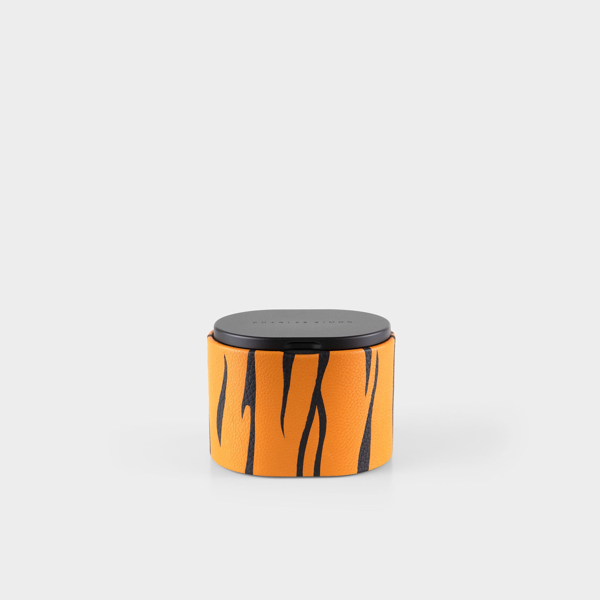 Product photo of side view of special edition tiger watch roll highlighting the stylish tiger pattern made from leather