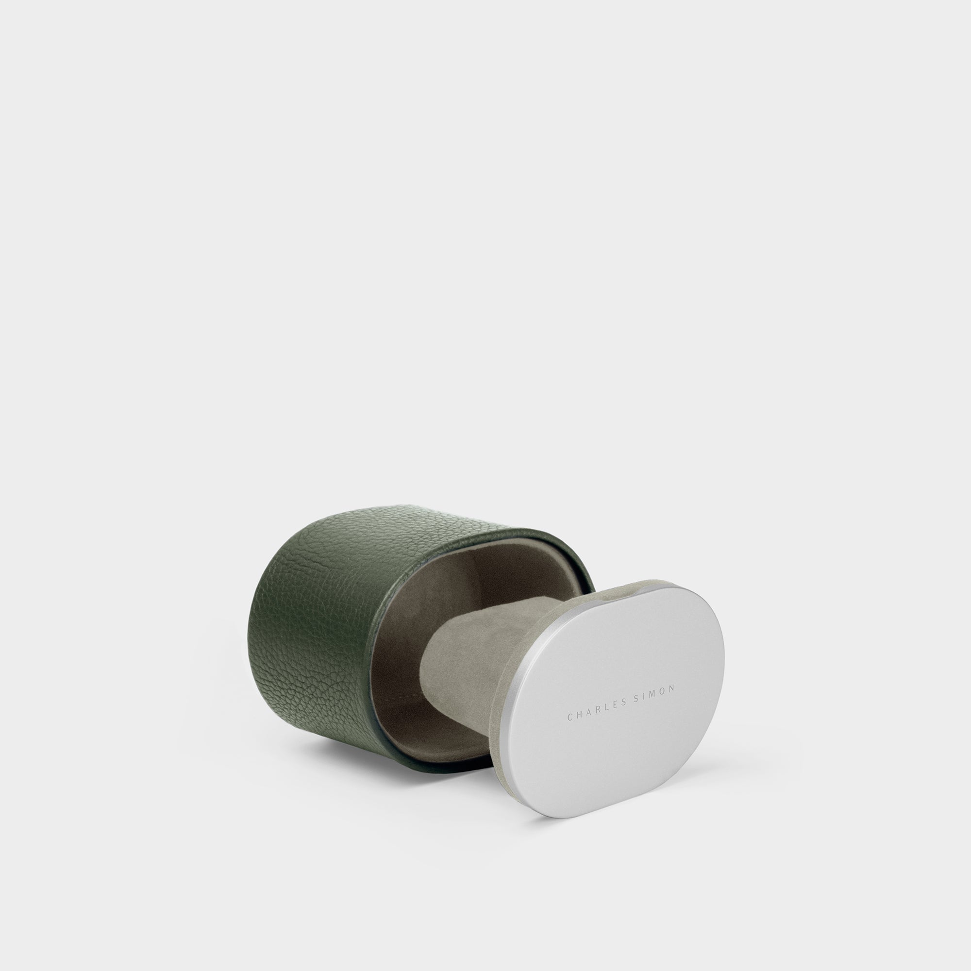 Product photo of open Theo watch roll in khaki leather and sea sand interior in 3/4 view.