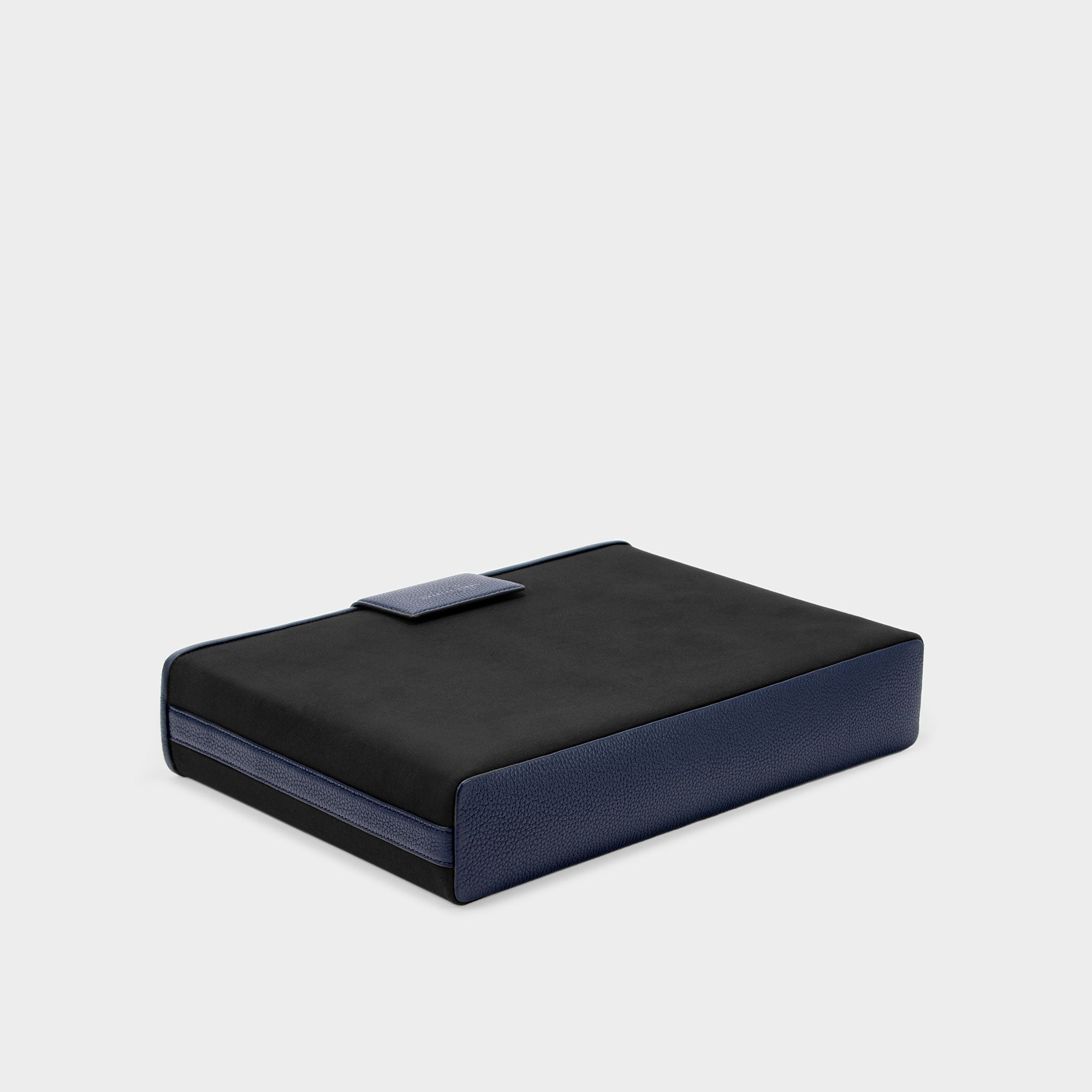 Product photo of the bottom of the protection cover for the Mackenzie by Charles Simon in black and marine leather details.