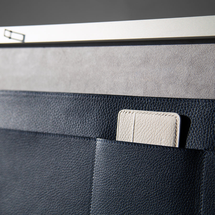 Detail photo of leather pockets of the Mackenzie Original Briefcase in marine and grey