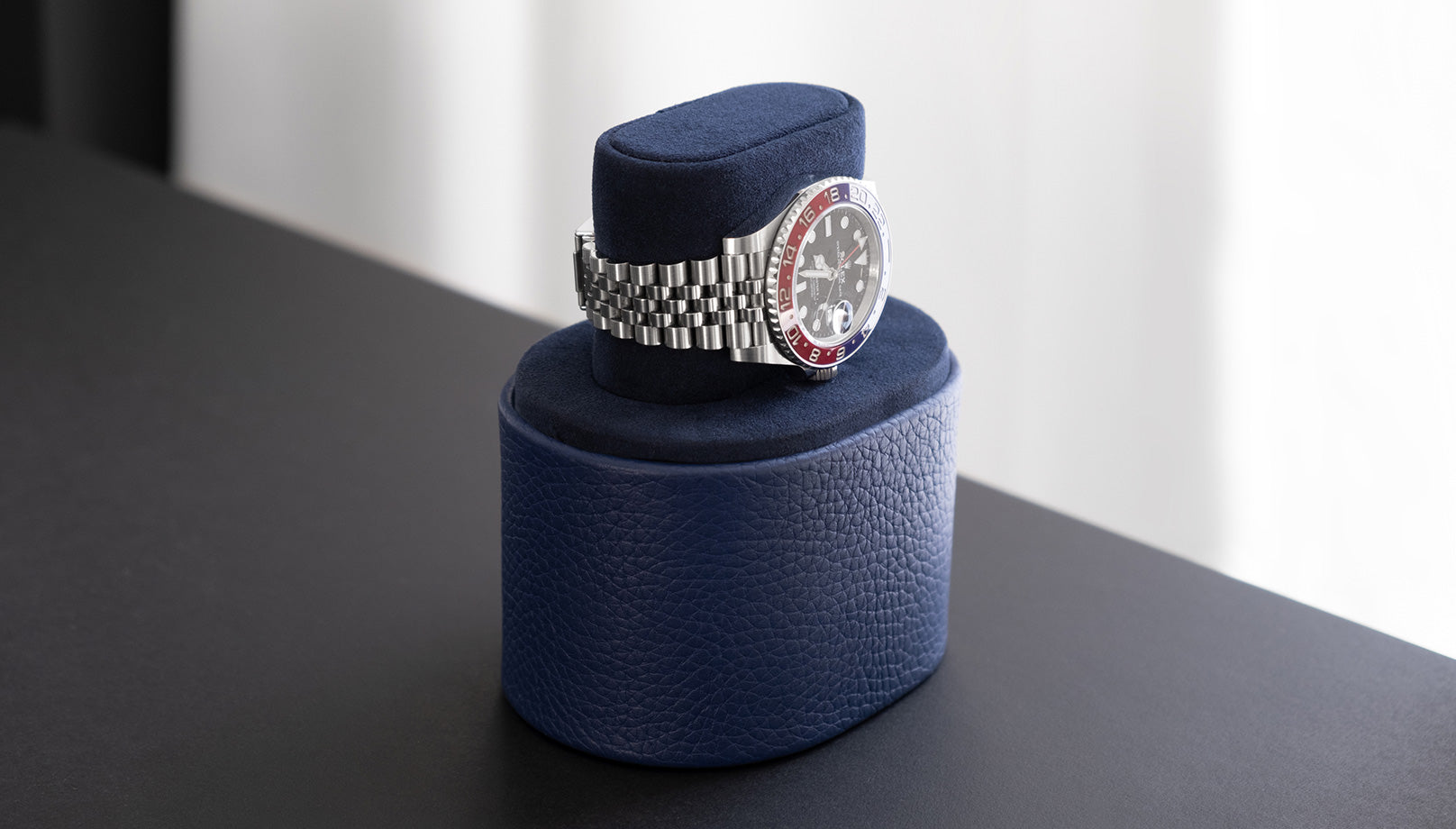 theo watch roll, luxury watch roll handmade in canada, photo of navy watch roll open with watch on top