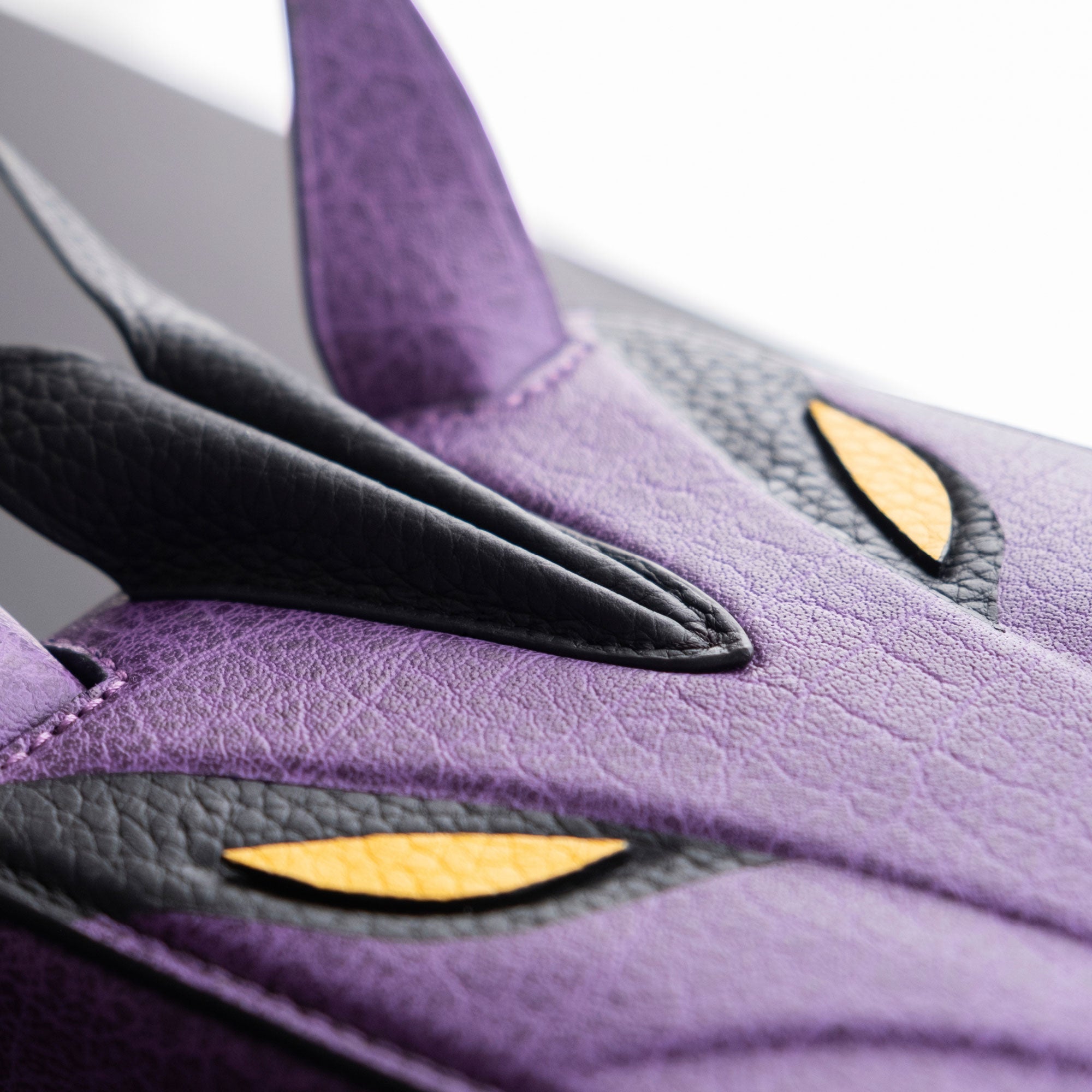 Detail photo of the leather work on the purple dragon Eaton 1 Watch case