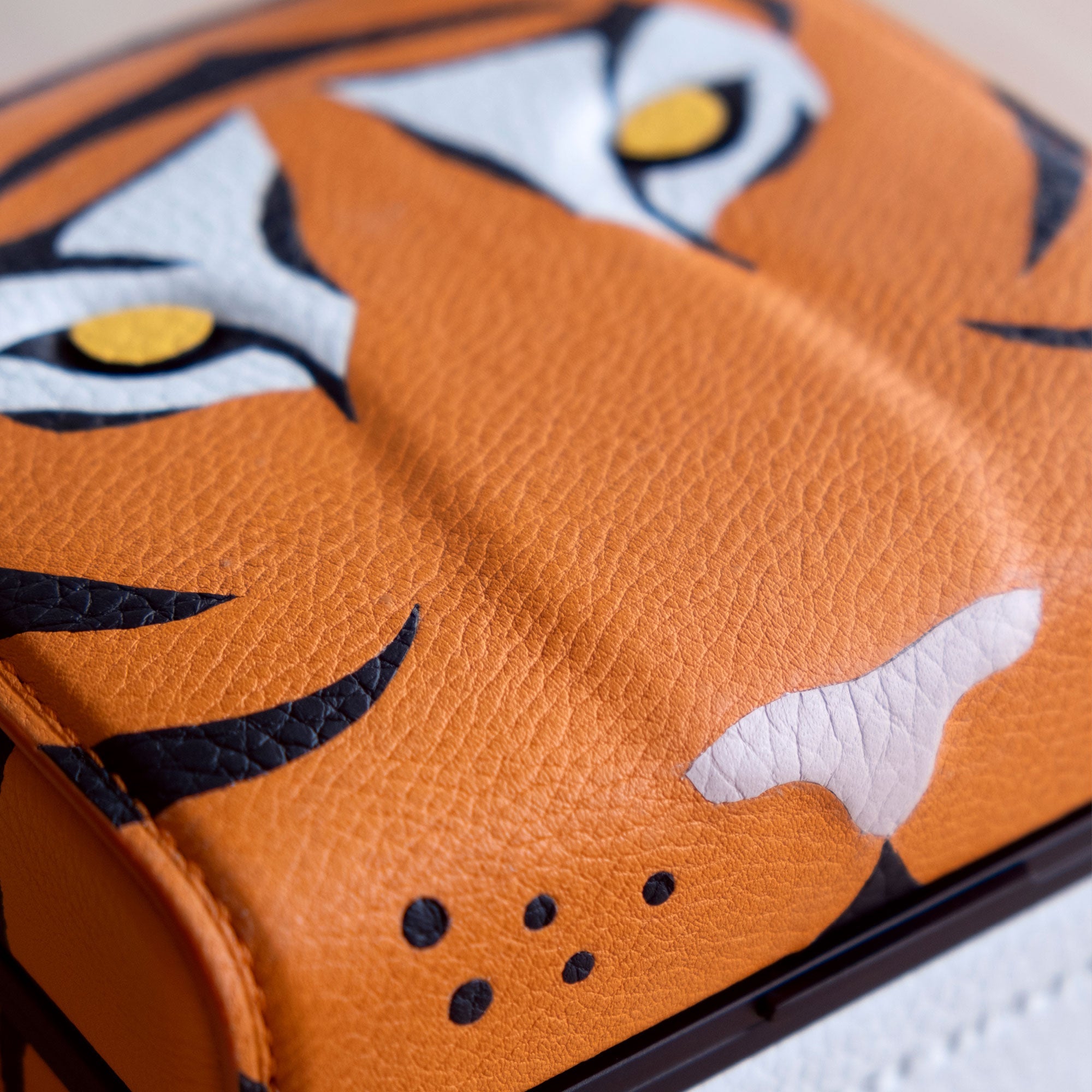 Closeup photo of the leather work on the special edition Eaton 1 Tiger watch case.  