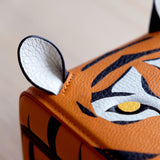 Detail photo of tiger ear of the Eaton 1 Special Edition Tiger Watch Case. Handcrafted from fine French leather.