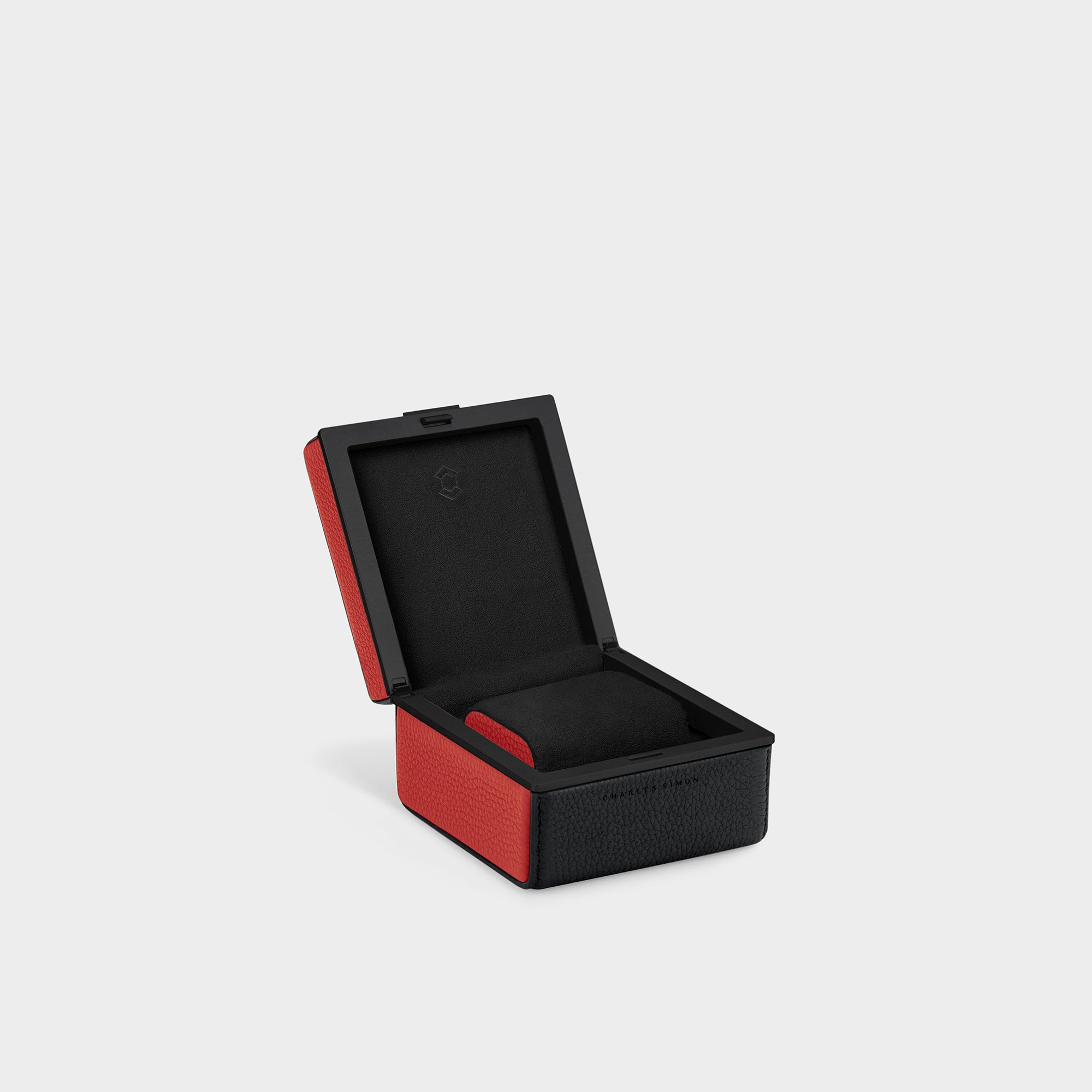 Eaton 1 watch case for 1 watch. Handmade from black French leather, anodized aluminum and Notte Alcantara interior with contrasting red leather accents