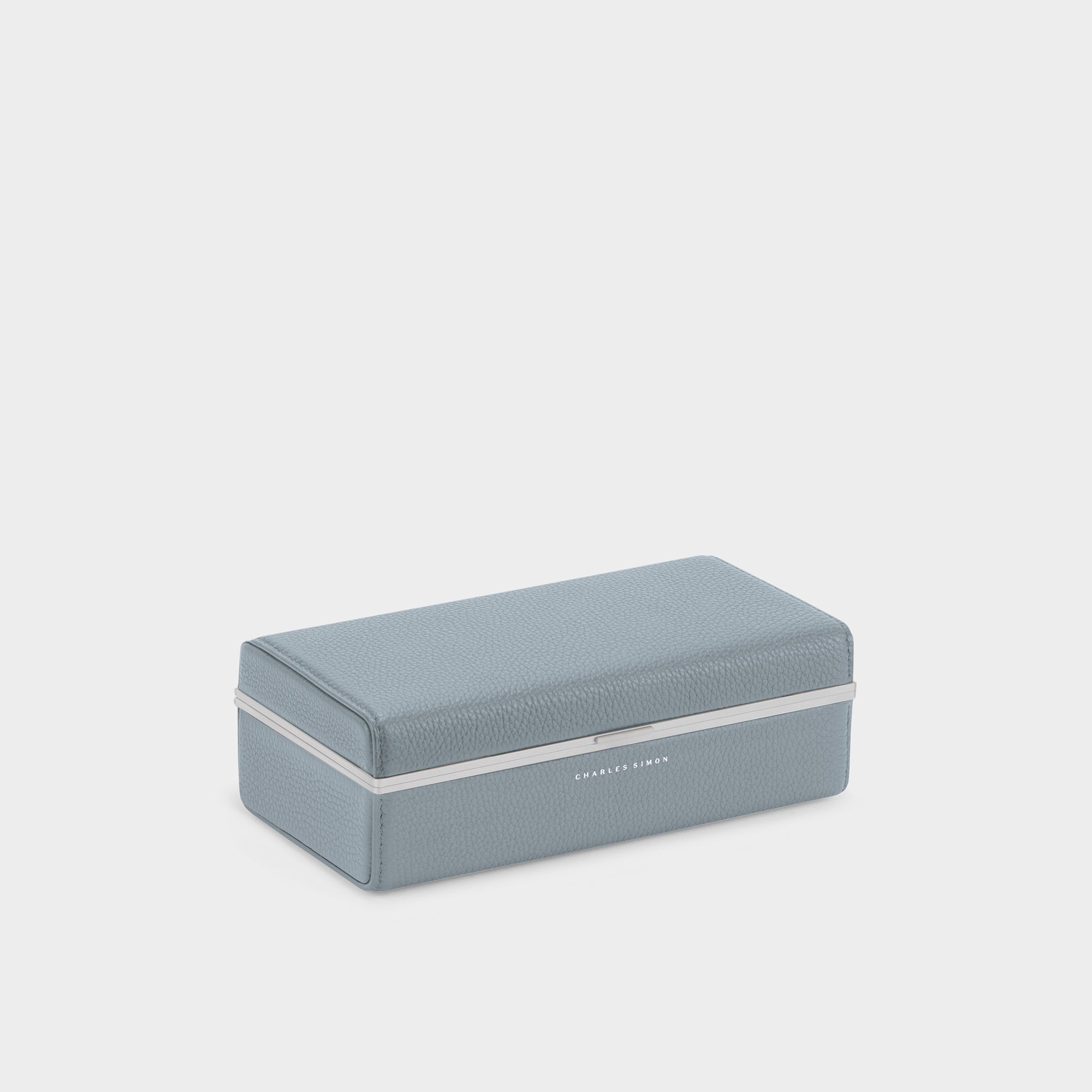 Charles Simon watch case made from cloud grey French leather, anodized aluminum and Alcantara interior lining