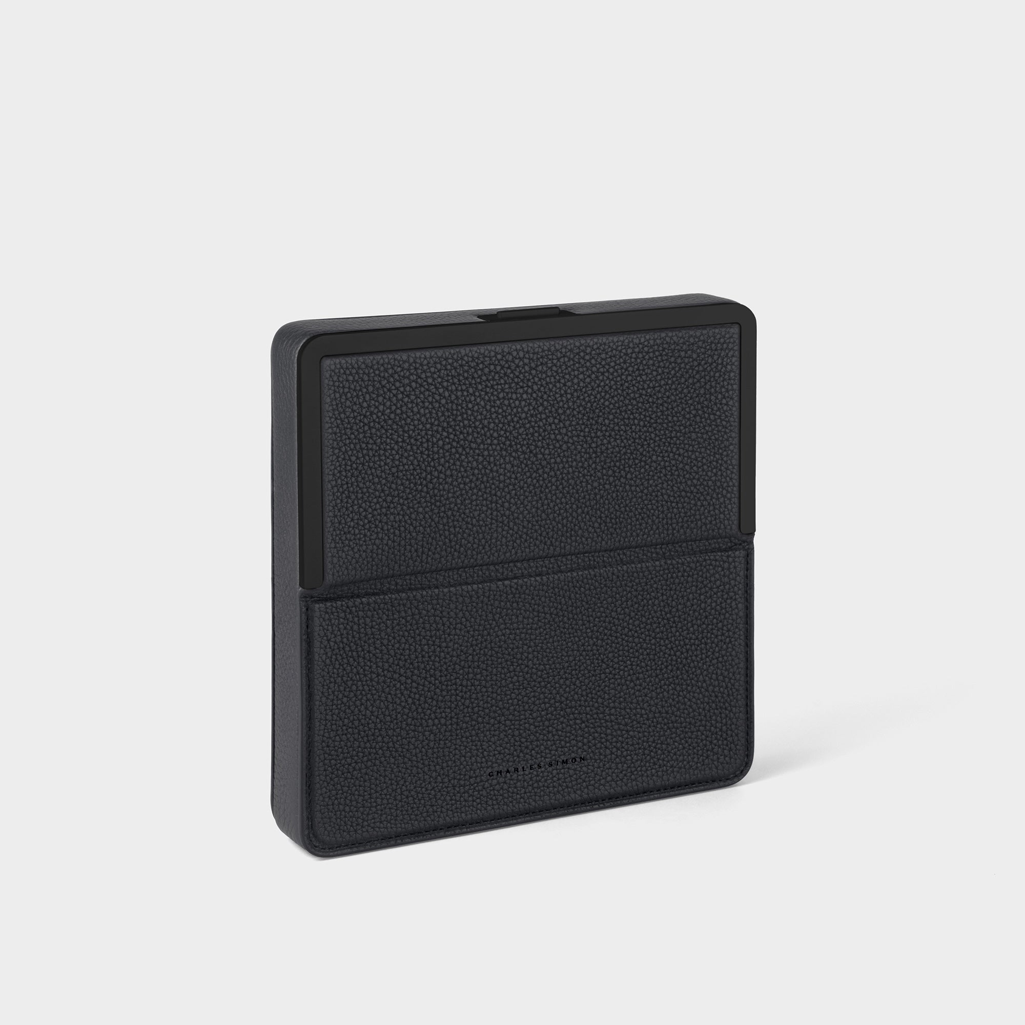 Product photo of the all black Fraser Travel Wallet. Handmade in Canada from premium materials.