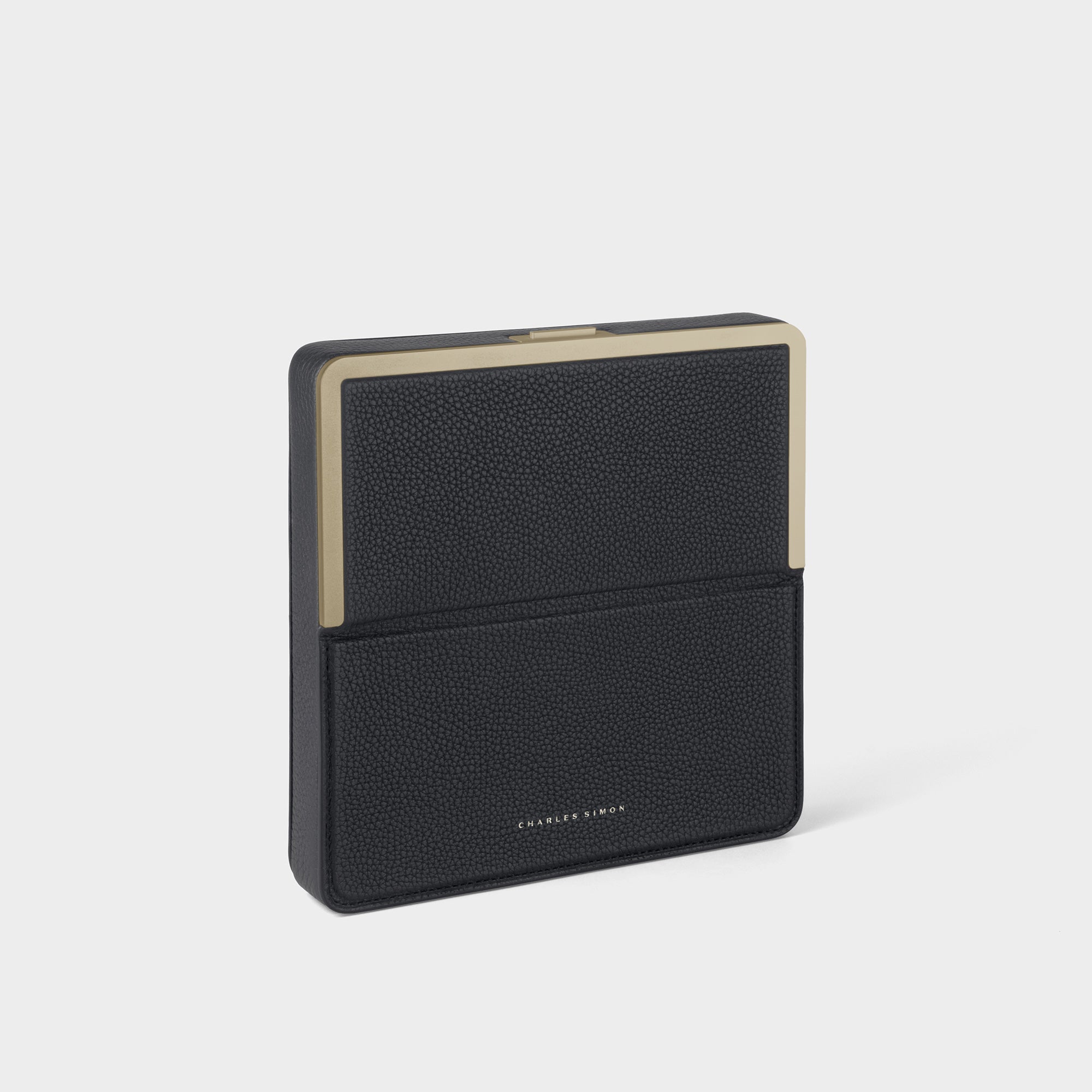 Product photo of gold travel wallet in black leather. Handmade in Canada to carry all essential travel goods
