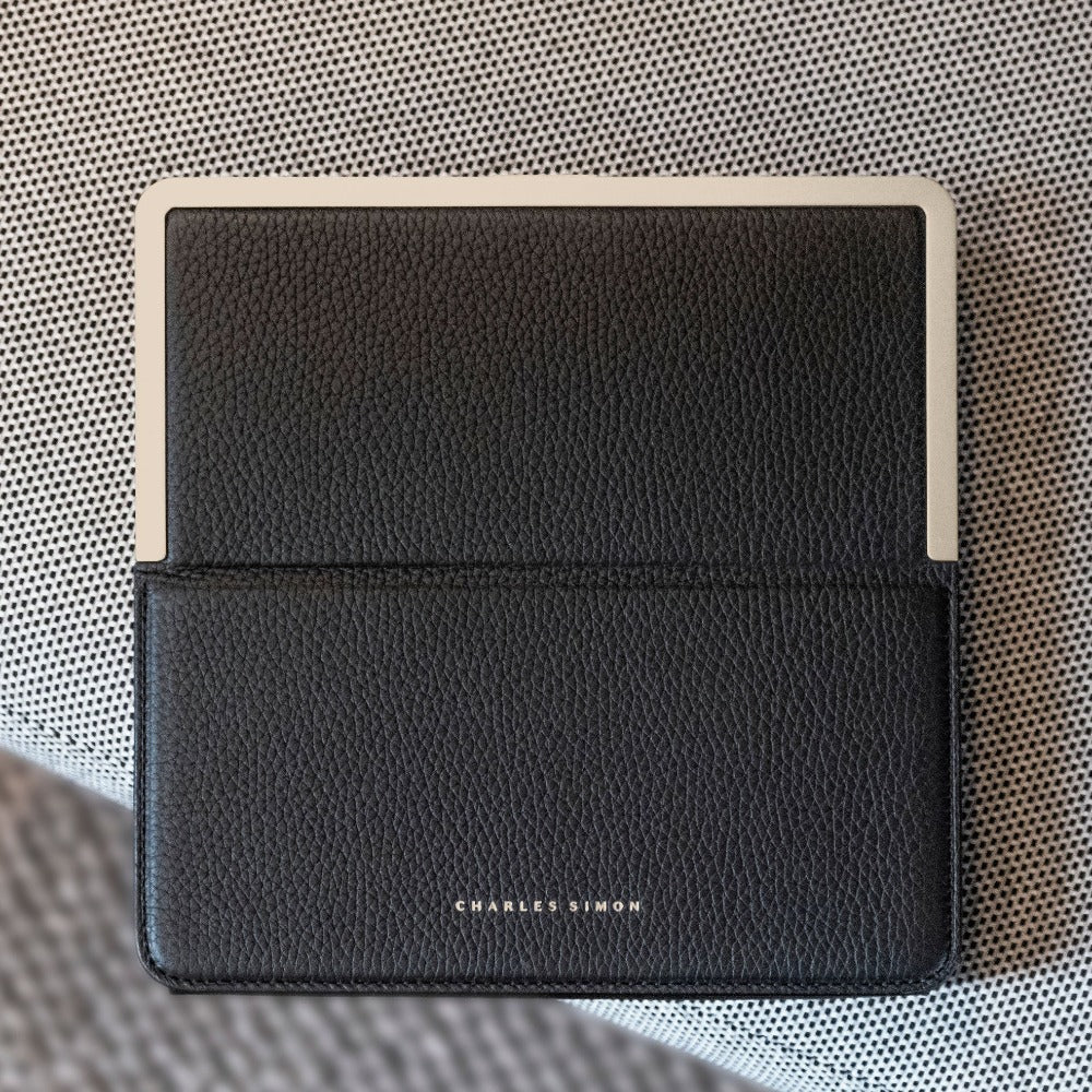 Lifestyle photo of minimalist travel wallet by Charles Simon. Handmade in Canada.