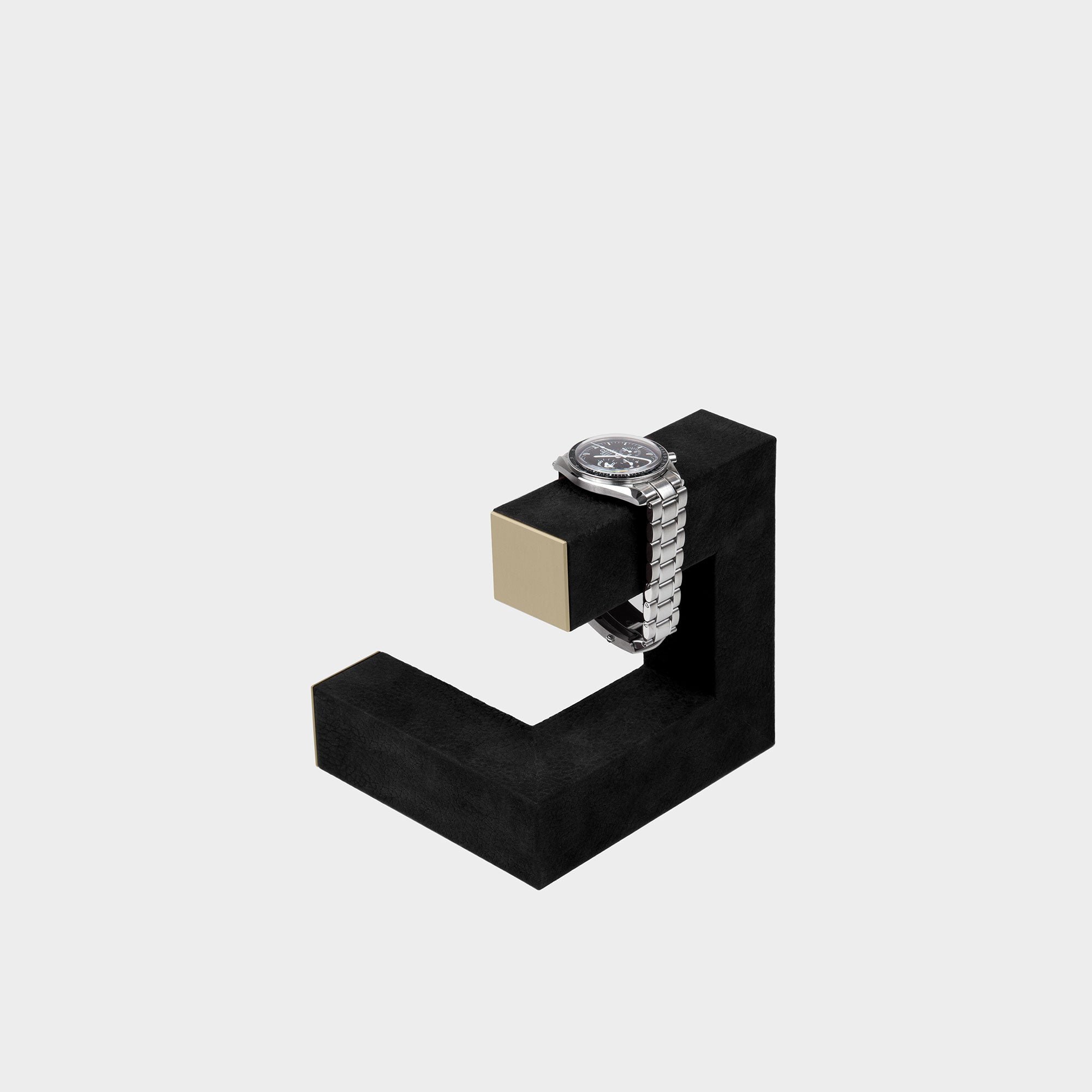 Product photo of Hudson 1 luxury watch stand in black and gold displaying 1 watch