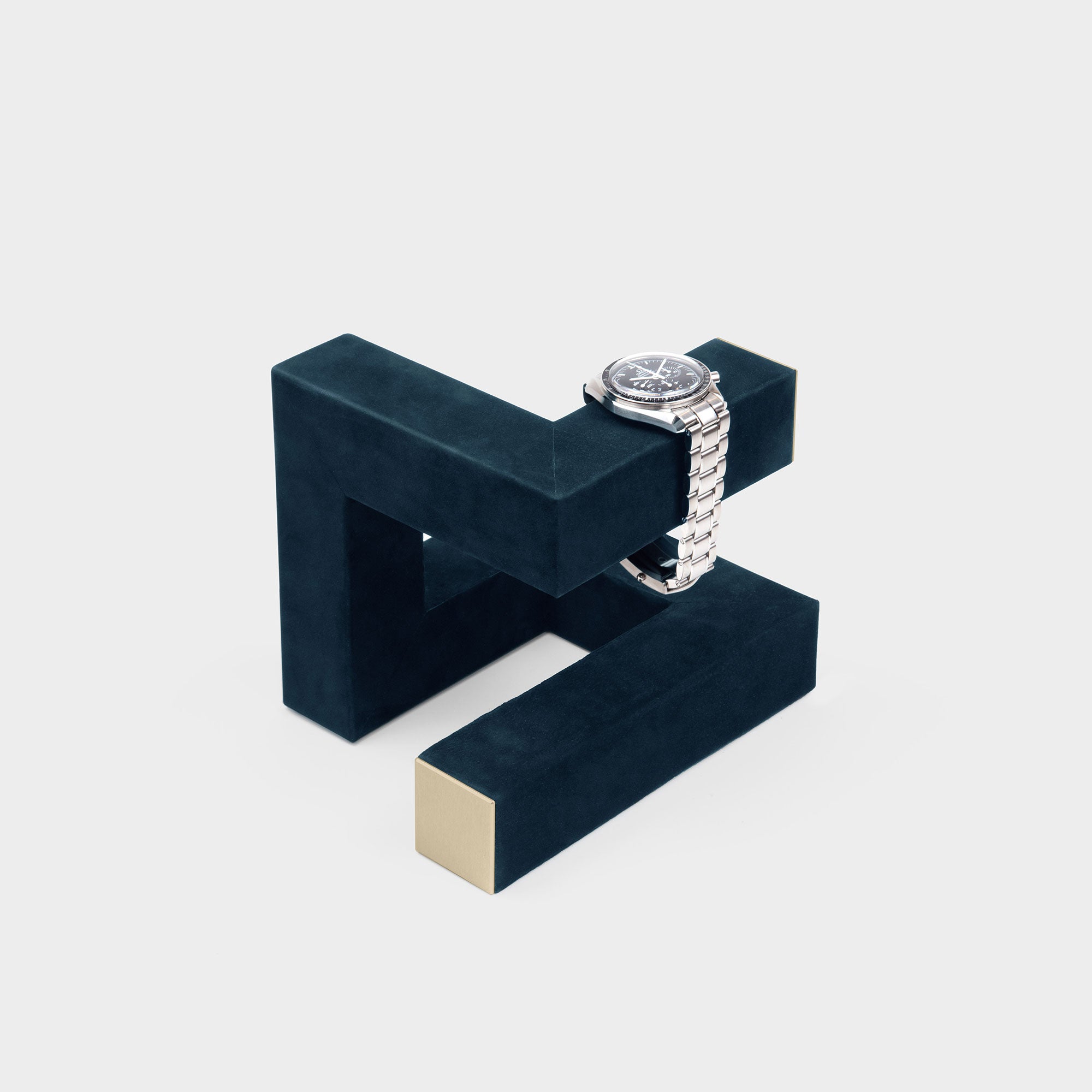 Hudson 3 Watch stand in gold and navy-teal showcasing luxury watches