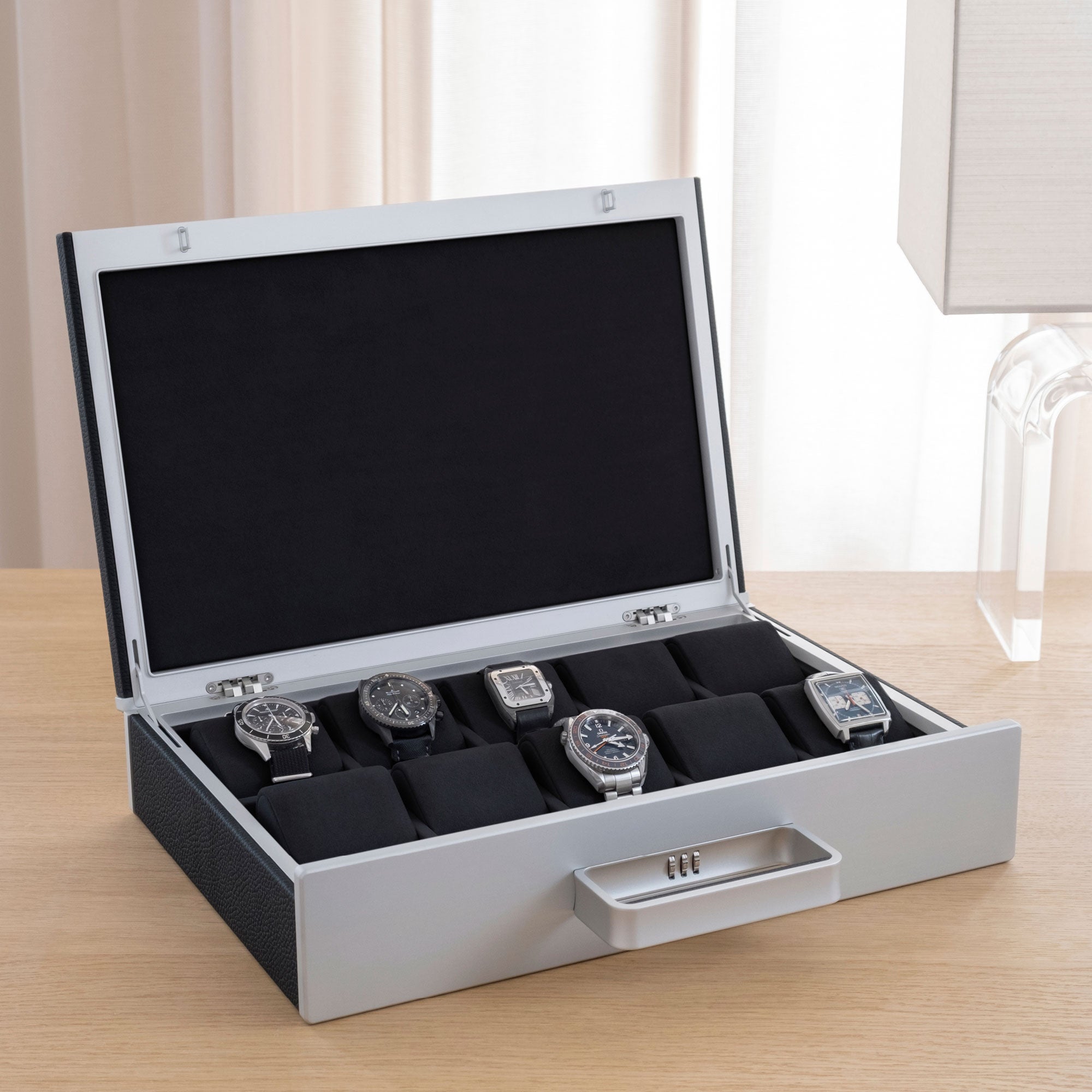Designer Watch briefcase for 10 watches in black leather, carbon fiber and grey anodized aluminum and notte Alcantara interior with luxury watches including Cartier, Omega and Jaeger-LeCoultre