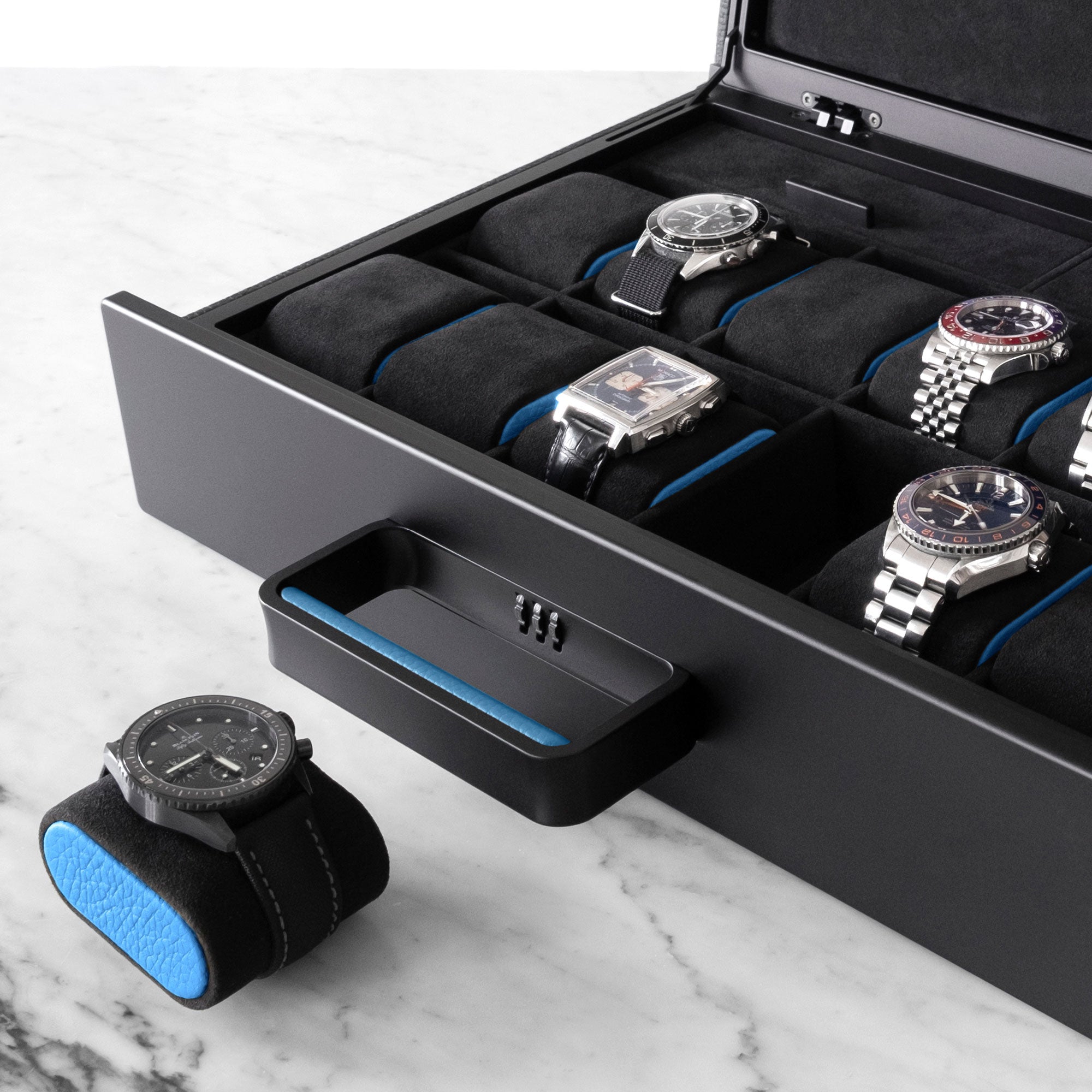 Detail shot showing removable black Alcantara watch cushion with sky blue leather side accents with Blancpain watch