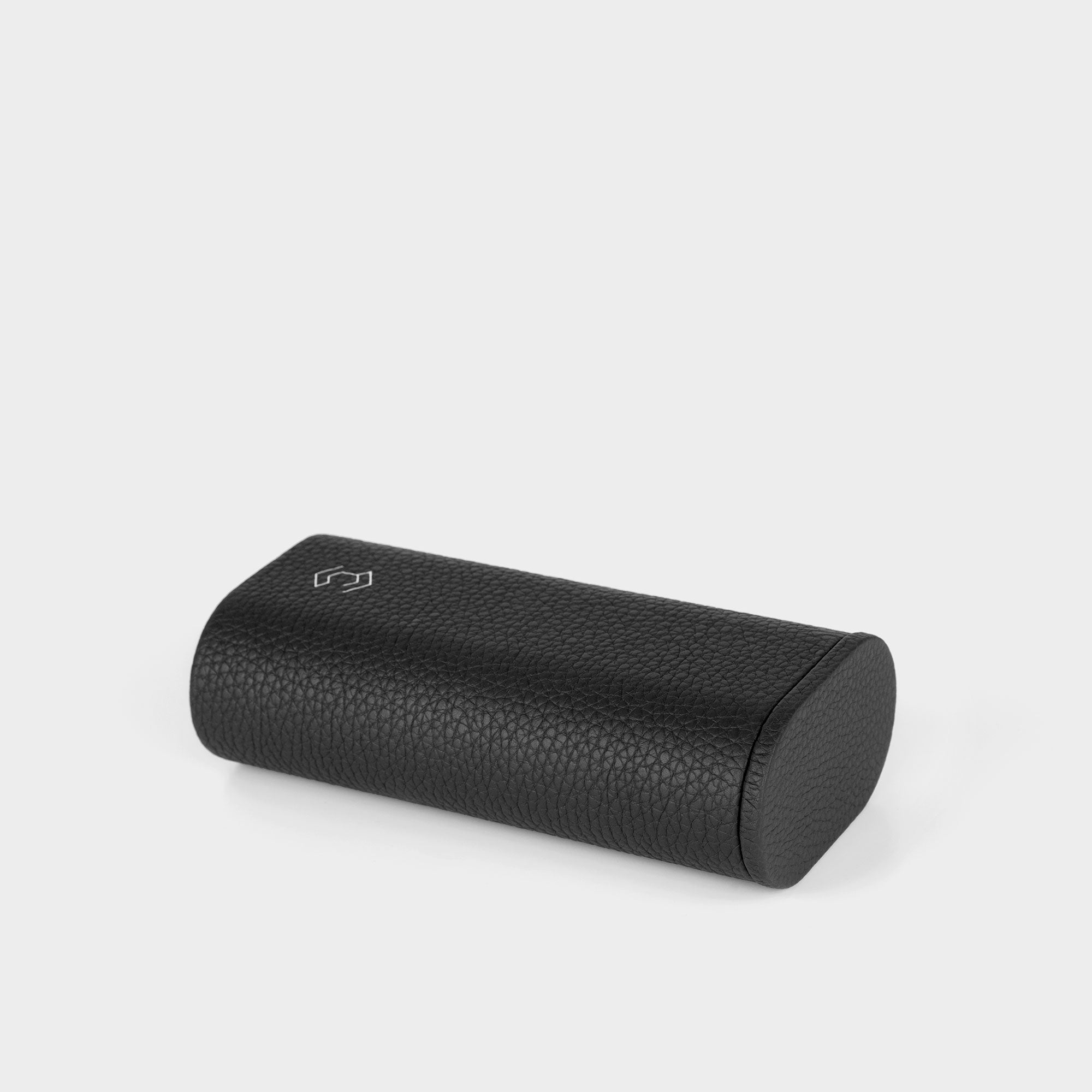 Product photo of closed and compact Oscar 1 Tall black leather watch roll