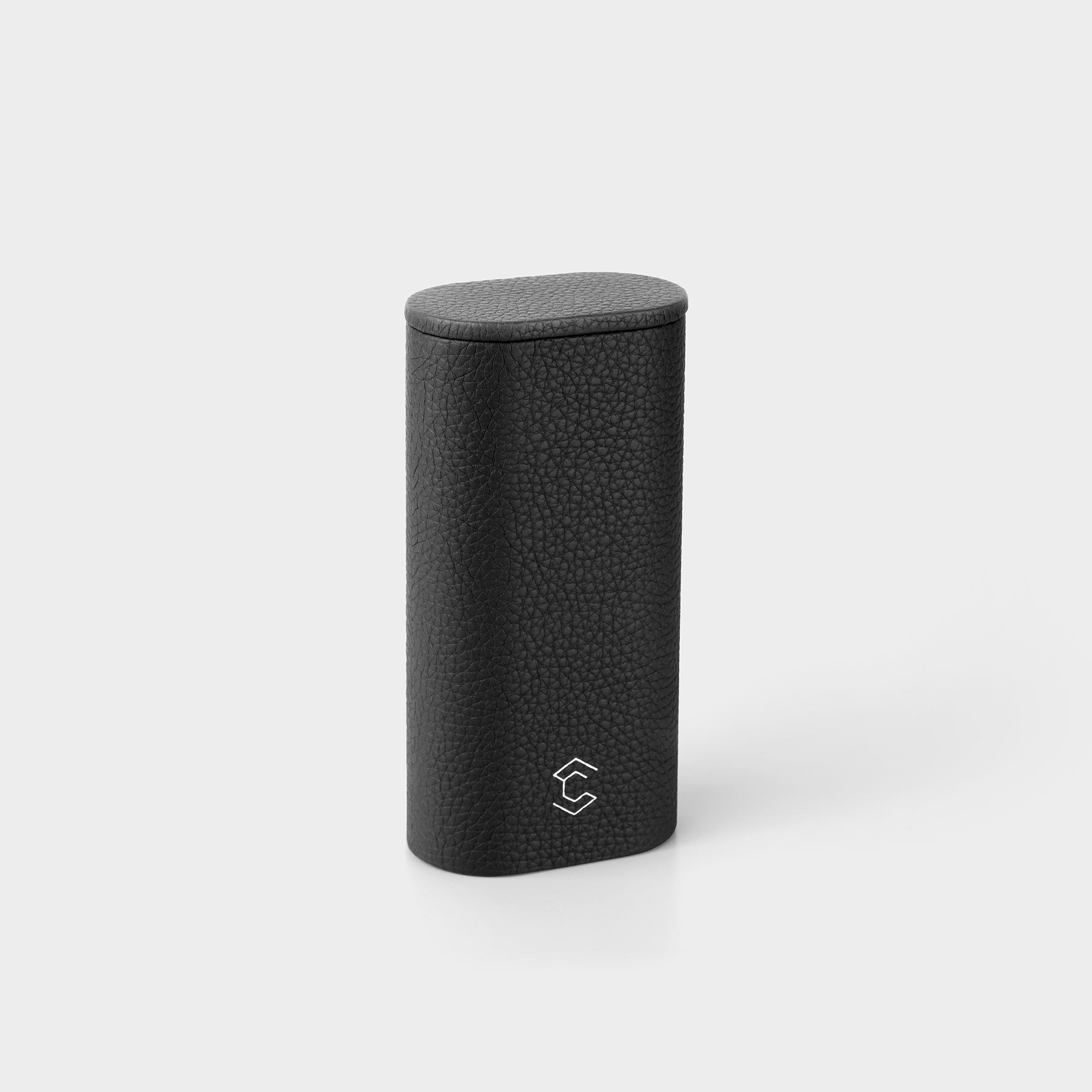 Product photo of closed standing Oscar 1 Tall Travel Watch roll made from black leather.