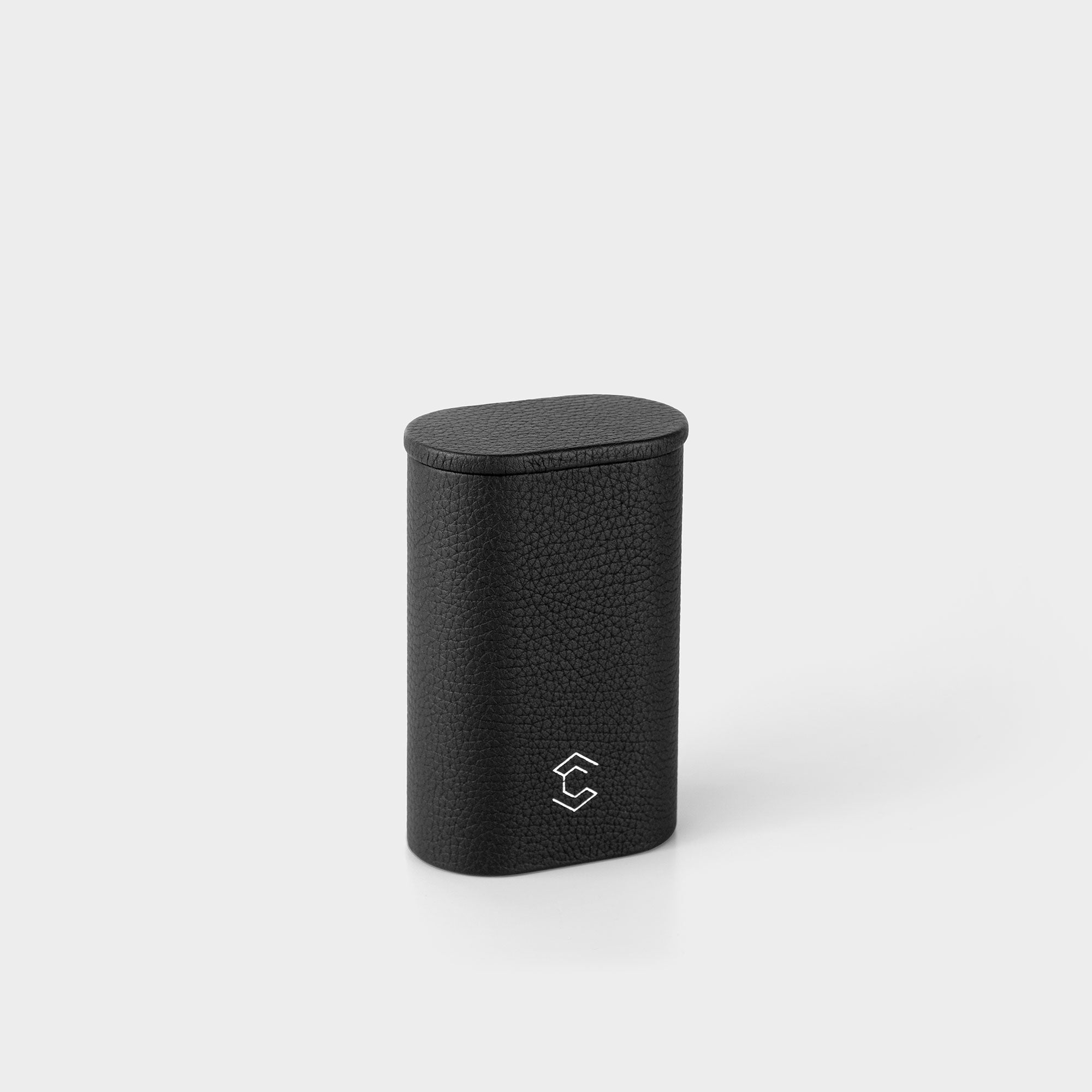 Product photo of closed standing leather watch roll in black by Charles Simon. Handmade in Canada.