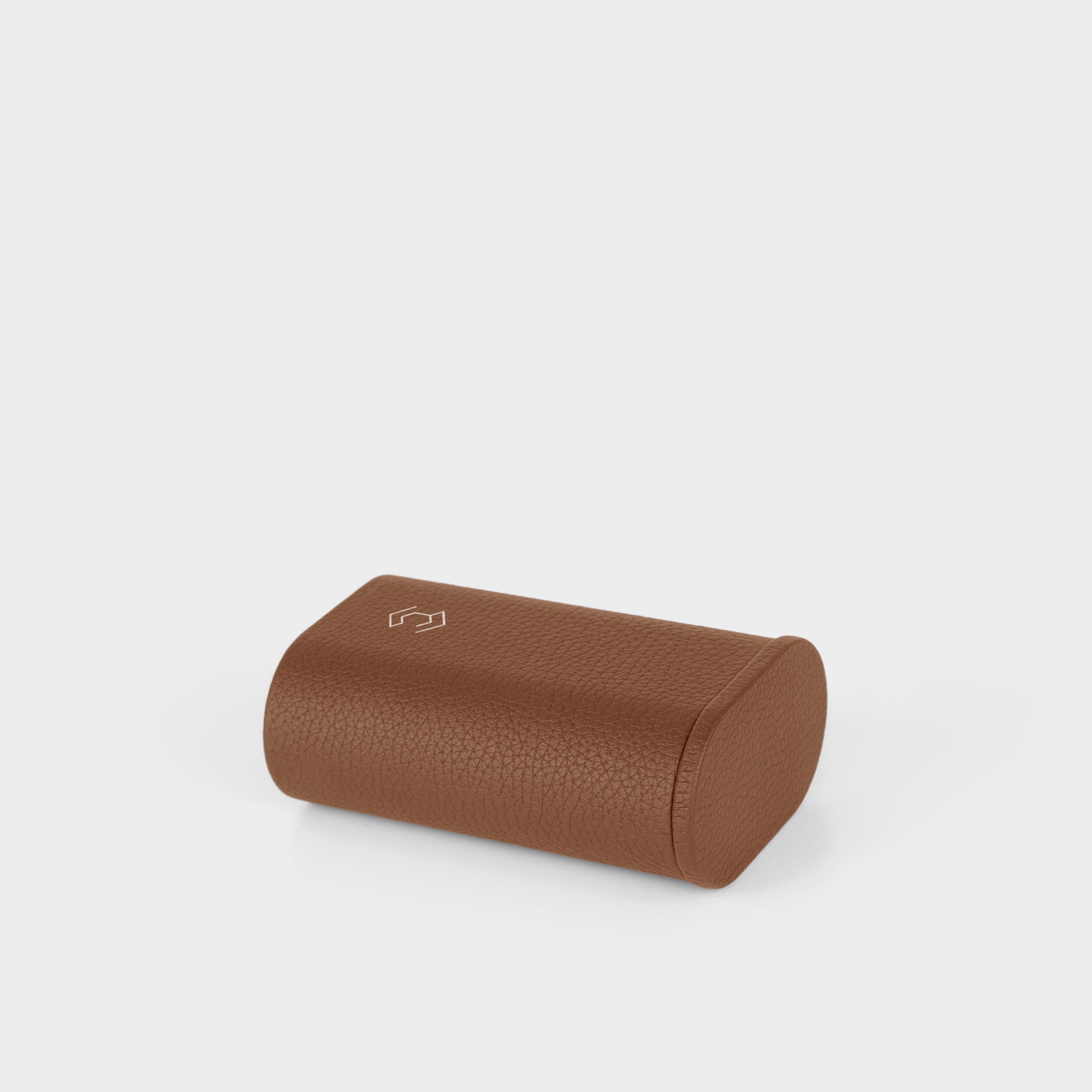 Product photo of closed tan leather Oscar 1 watch roll 