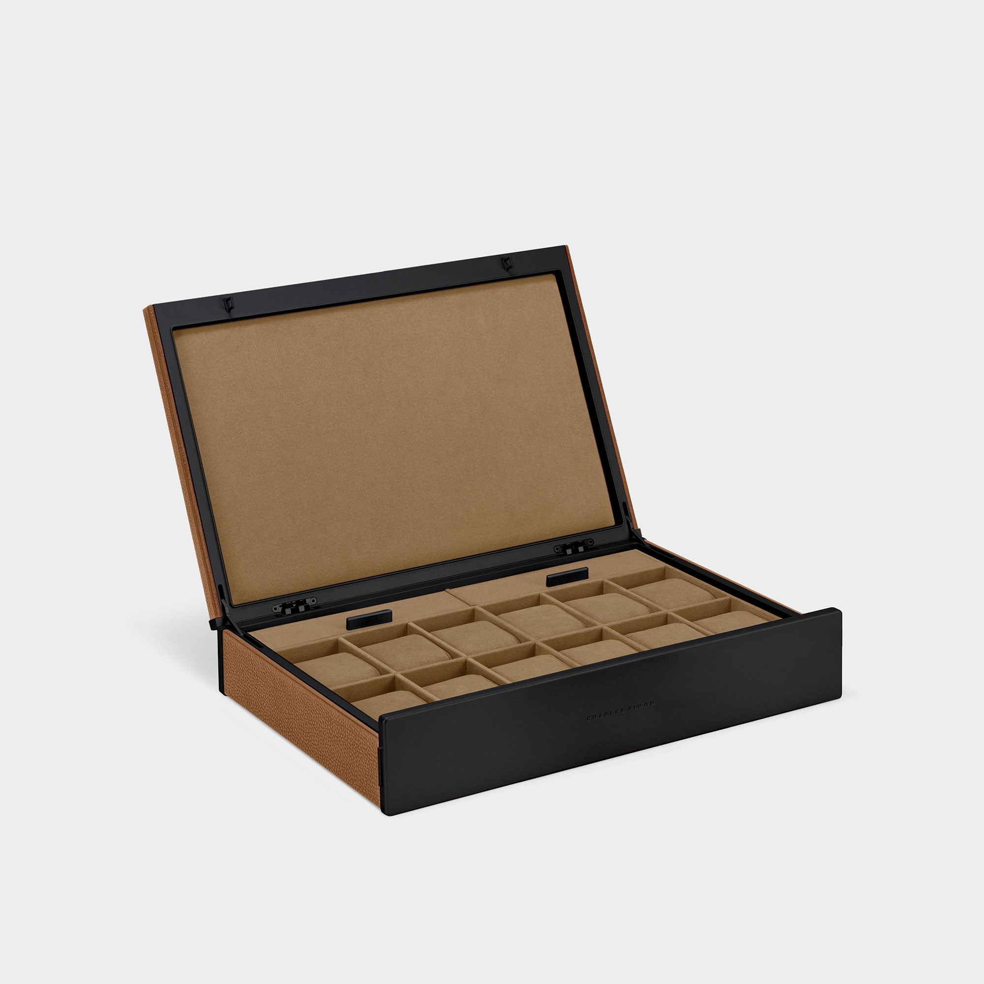 Product photo of open handmade watch box for 12 watches in tan leather, black carbon fiber and anodized aluminum casing and camel Alcantara interior