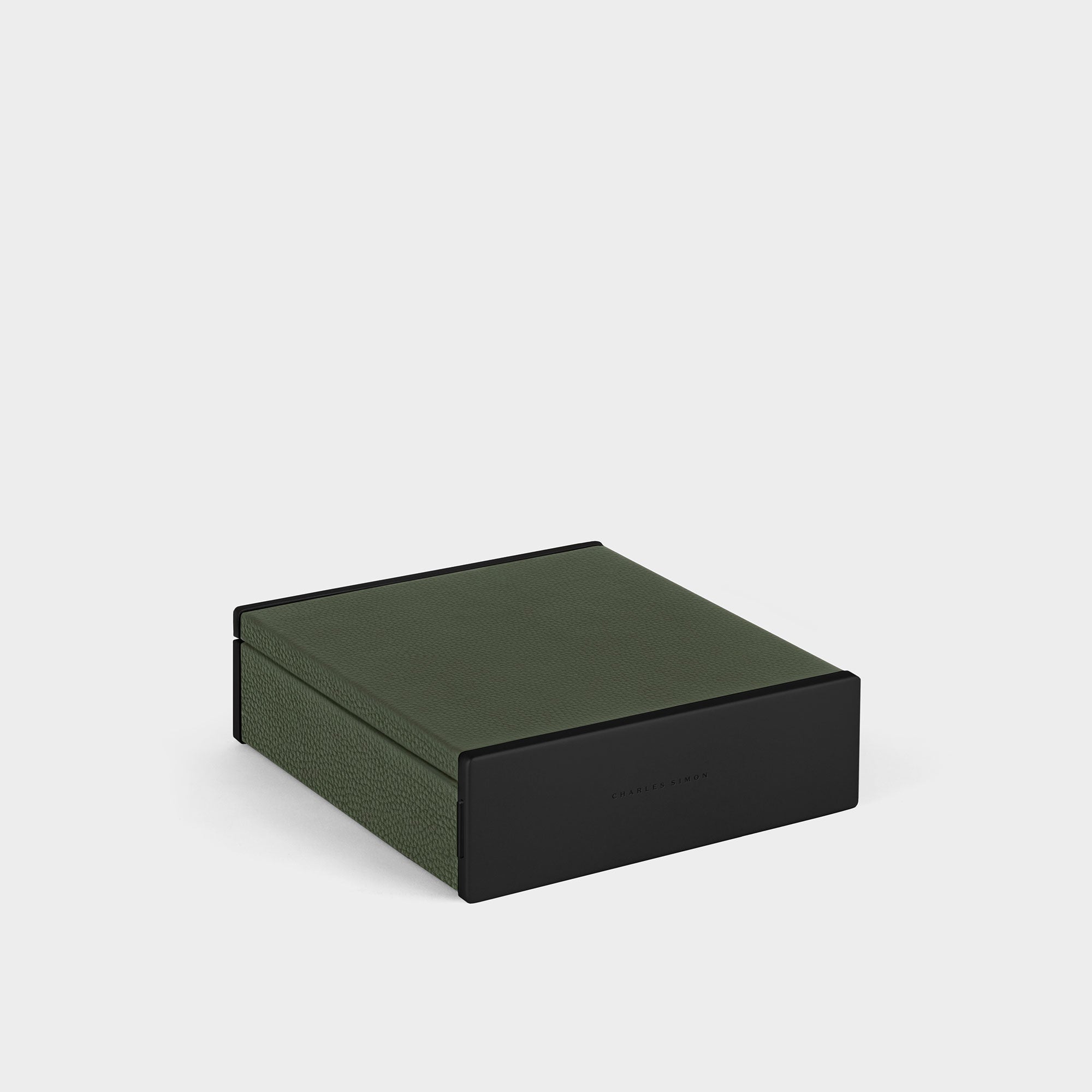Closed all black luxury watch box by Charles Simon. Handcrafted in Canada from khaki leather and Notte interior.