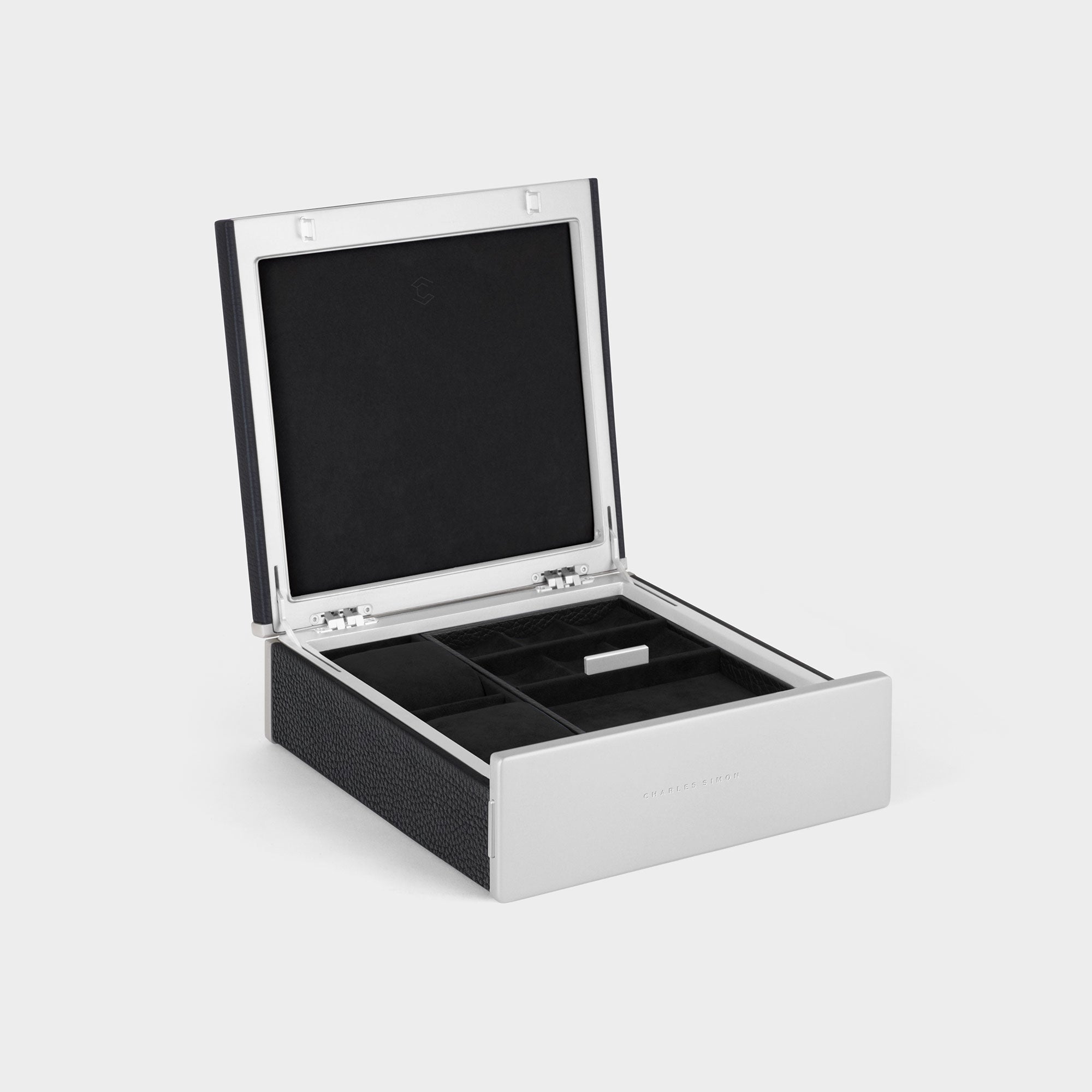 Product photo of open Taylor 2 Watch and Jewelry box in black leather and notte interior showing jewelry storage compartments and two watch cushions