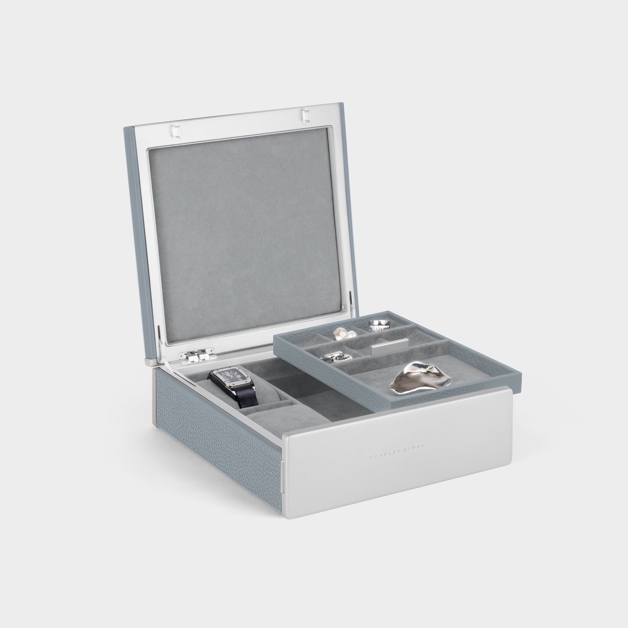 Product photo of open Taylor 2 Watch box in cloud grey leather and fog grey interior showcasing the boxe's removable jewelry tray for stylish and convenient jewelry organization and storage