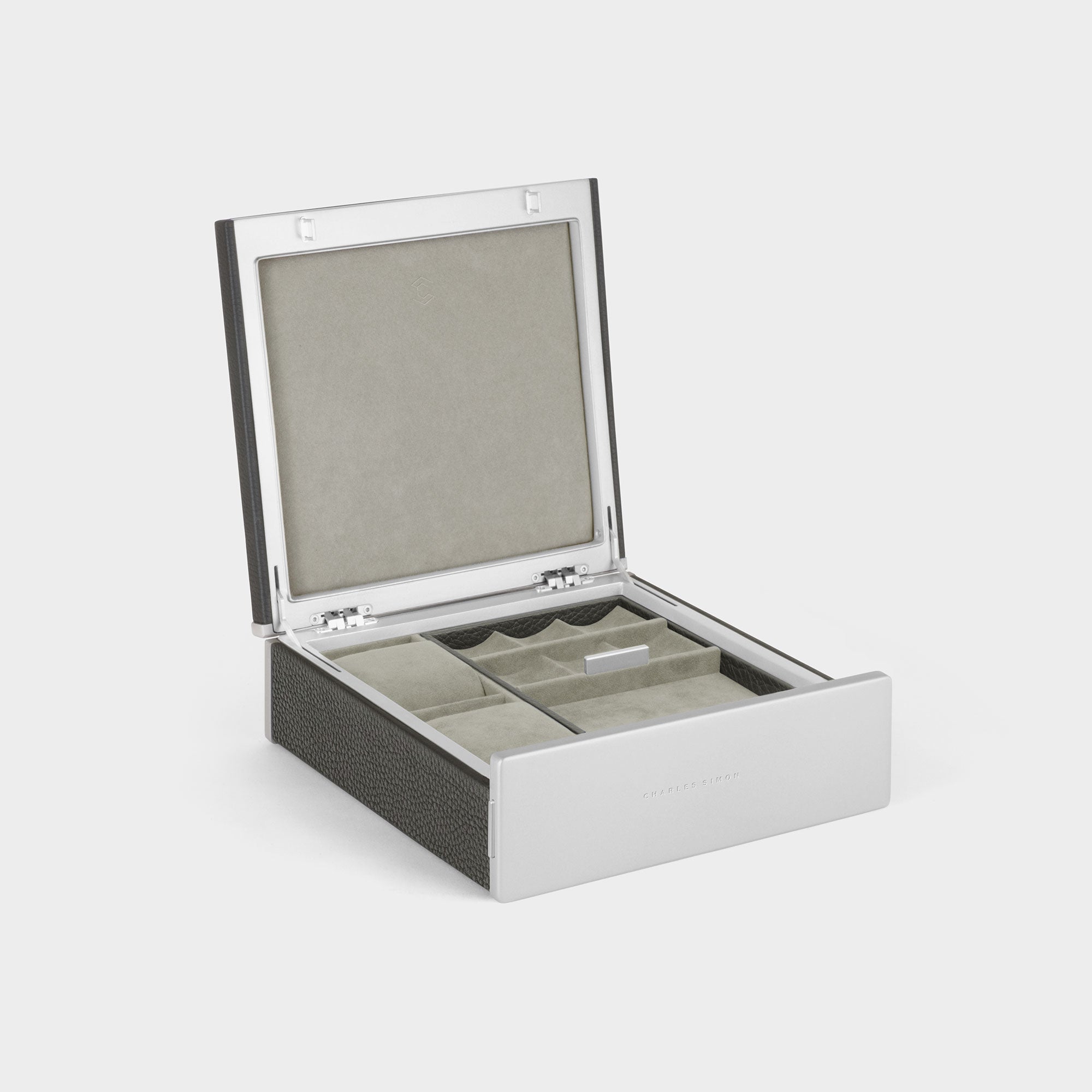 Product photo of open Taylor 2 Watch and Jewelry box in graphite leather and sea sand interior showing jewelry storage compartments and two watch cushions