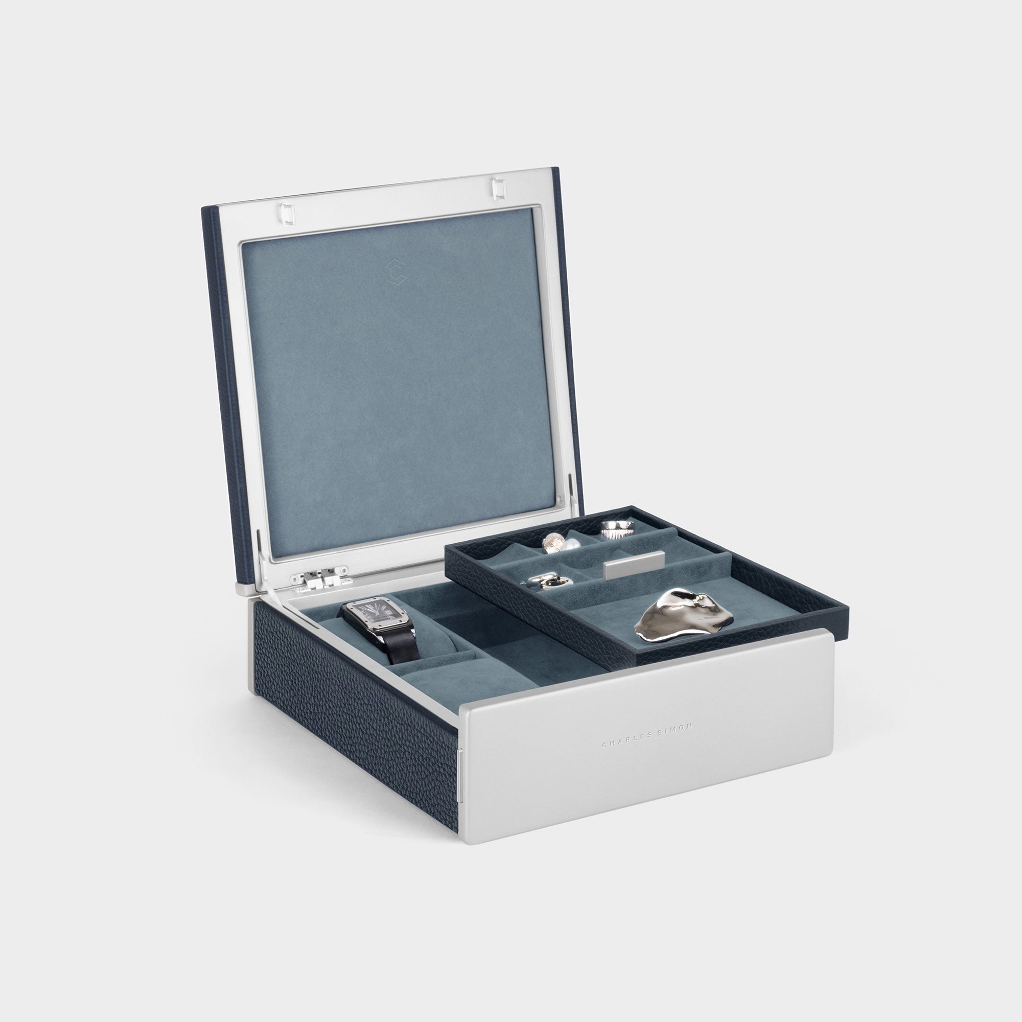 Product photo of open Taylor 2 Watch and Jewelry box in marine leather, highlighting the removable jewelry tray that serves to organize and store rings, earrings, bracelets and more.