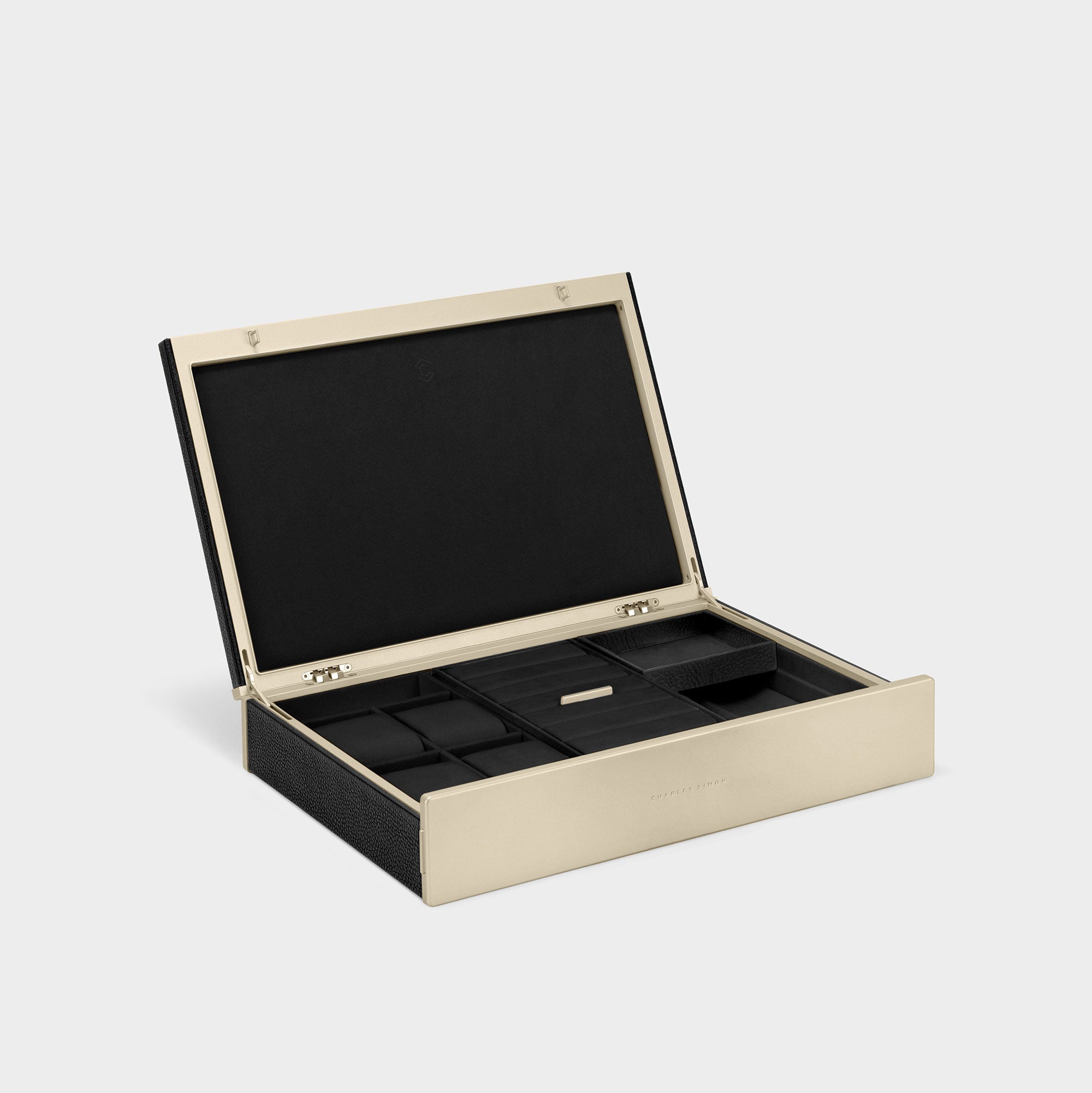 Product photo of open Taylor 4 gold luxury watch and jewelry box featuring black young bull leather and a carbon fiber and anodized aluminum frame.  Handmade in Canada to organize your jewelry and watches. 