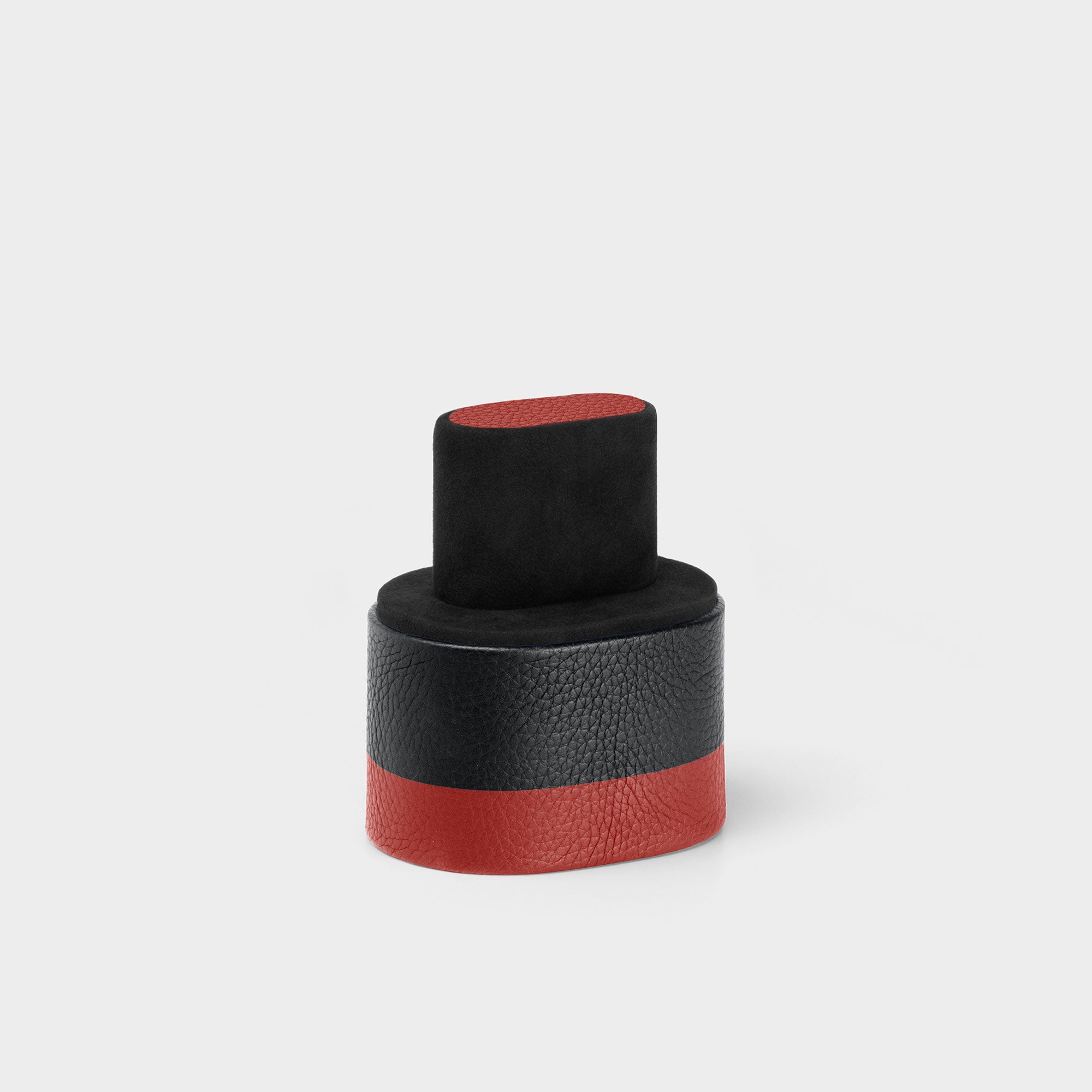 Product photo showcasing the soft Alcantara cushion of the F1 Theo leather Watch roll in black and red. Handmade in Canada for a single timepiece. 