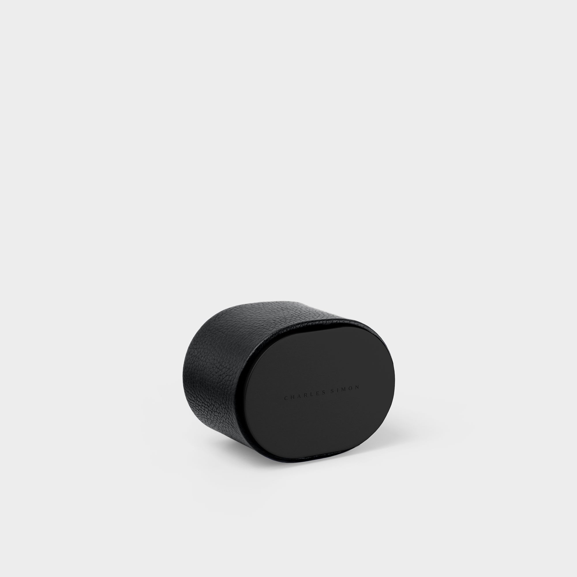 Closed all black Theo handmade travel watch roll by Charles Simon